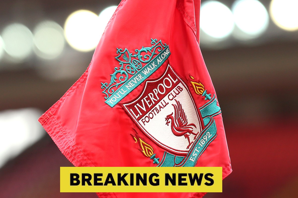 Liverpool FC corner flag with 'breaking news' banner