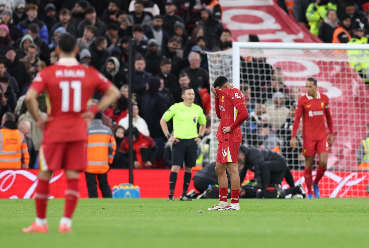 Liverpool players react during their draw with Fulham