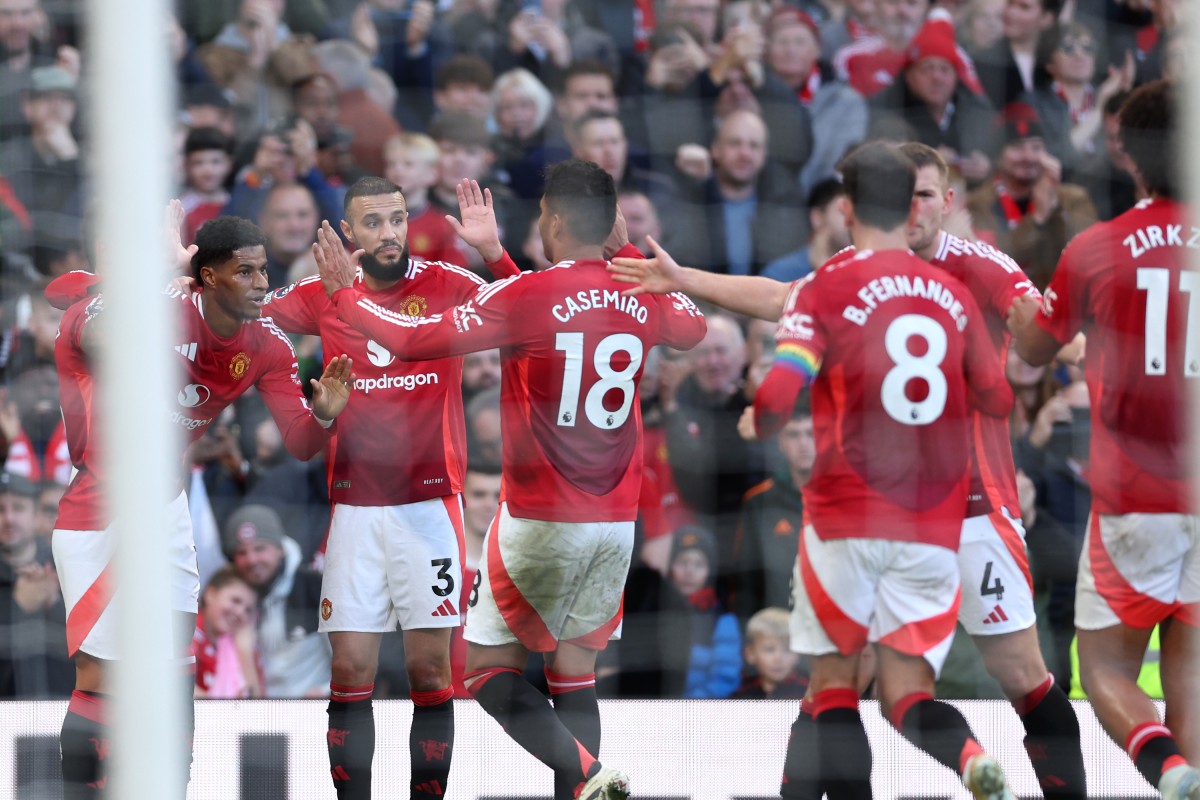 Marcus Rashford celebrates with his Manchester United teammates