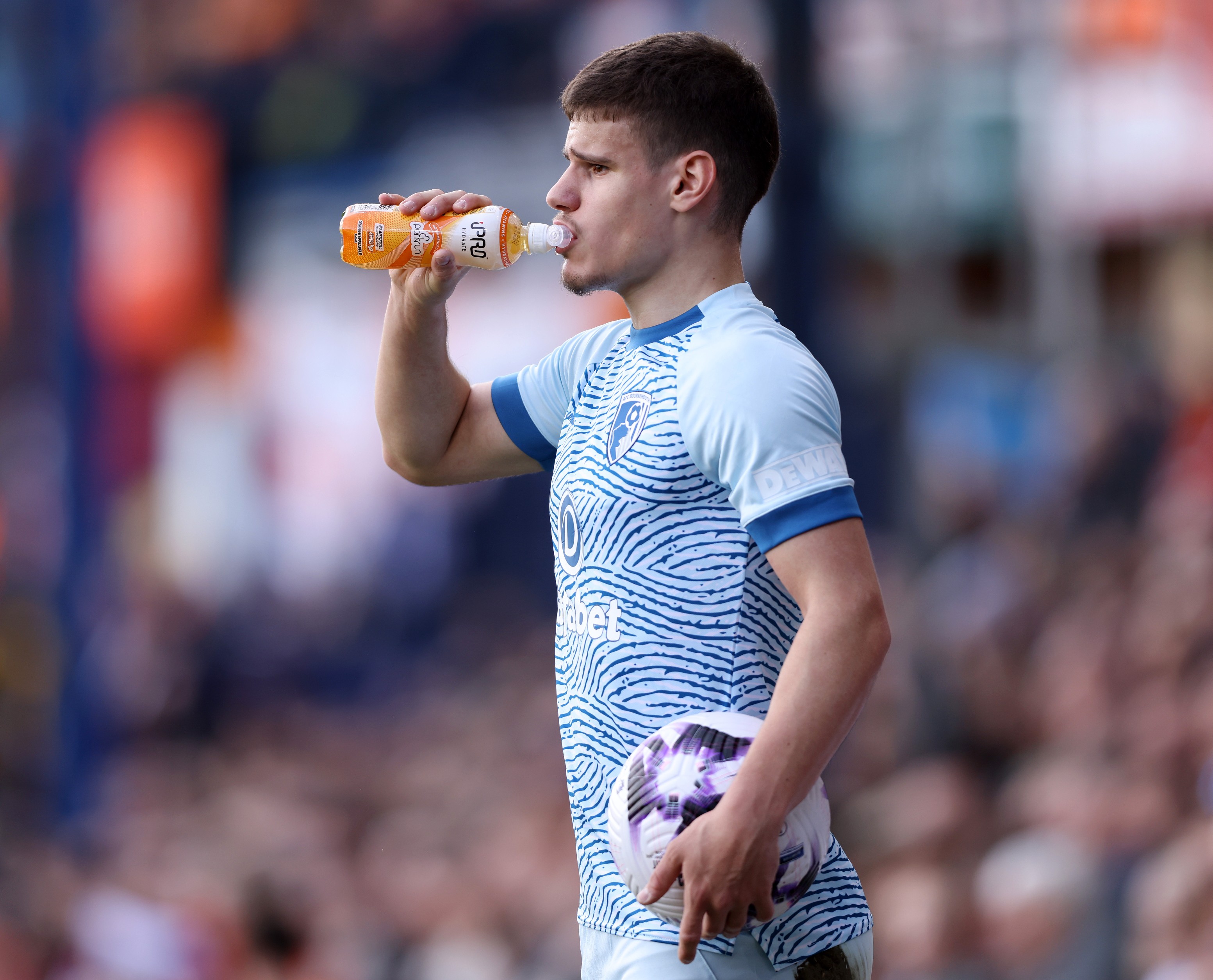 Milos Kerkez taking a throw-in for Bournemouth