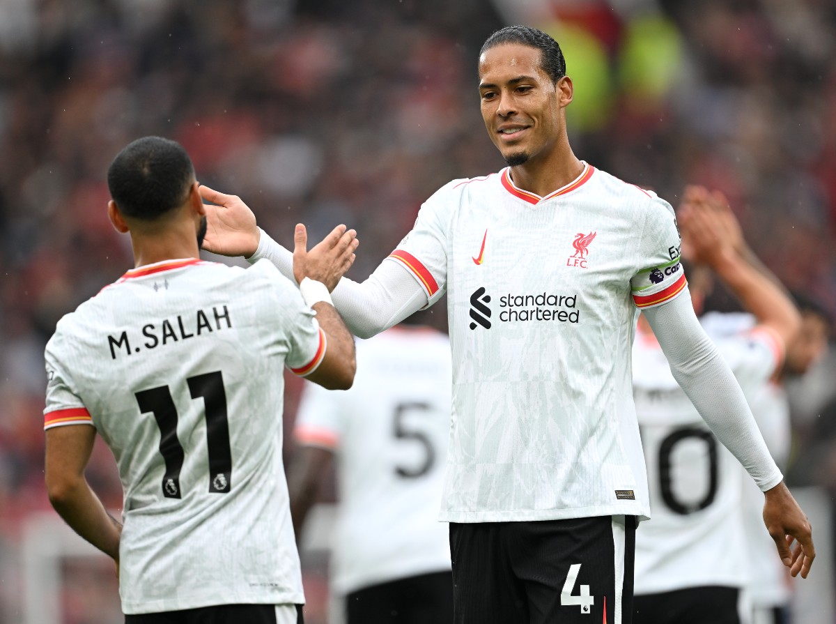 Mohamed Salah and Virgil van Dijk celebrate Liverpool's victory over Man United