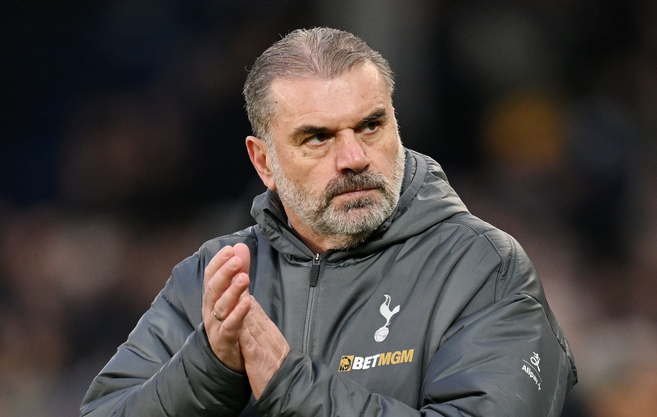 Ange Postecoglou, Manager of Tottenham Hotspur, acknowledges the fans