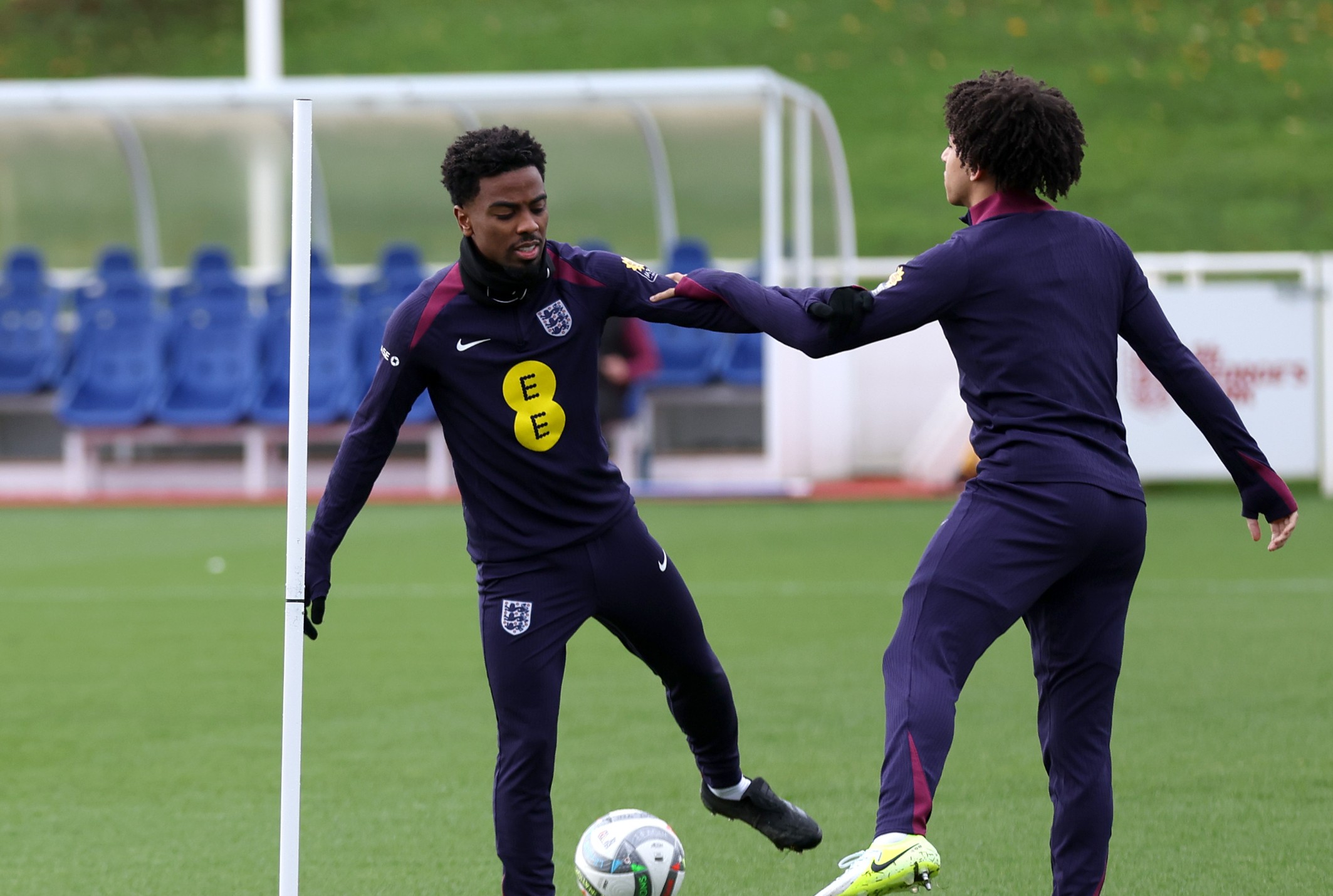 Angel Gomes and Rico Lewis of England train during a training session at St Georges Park.