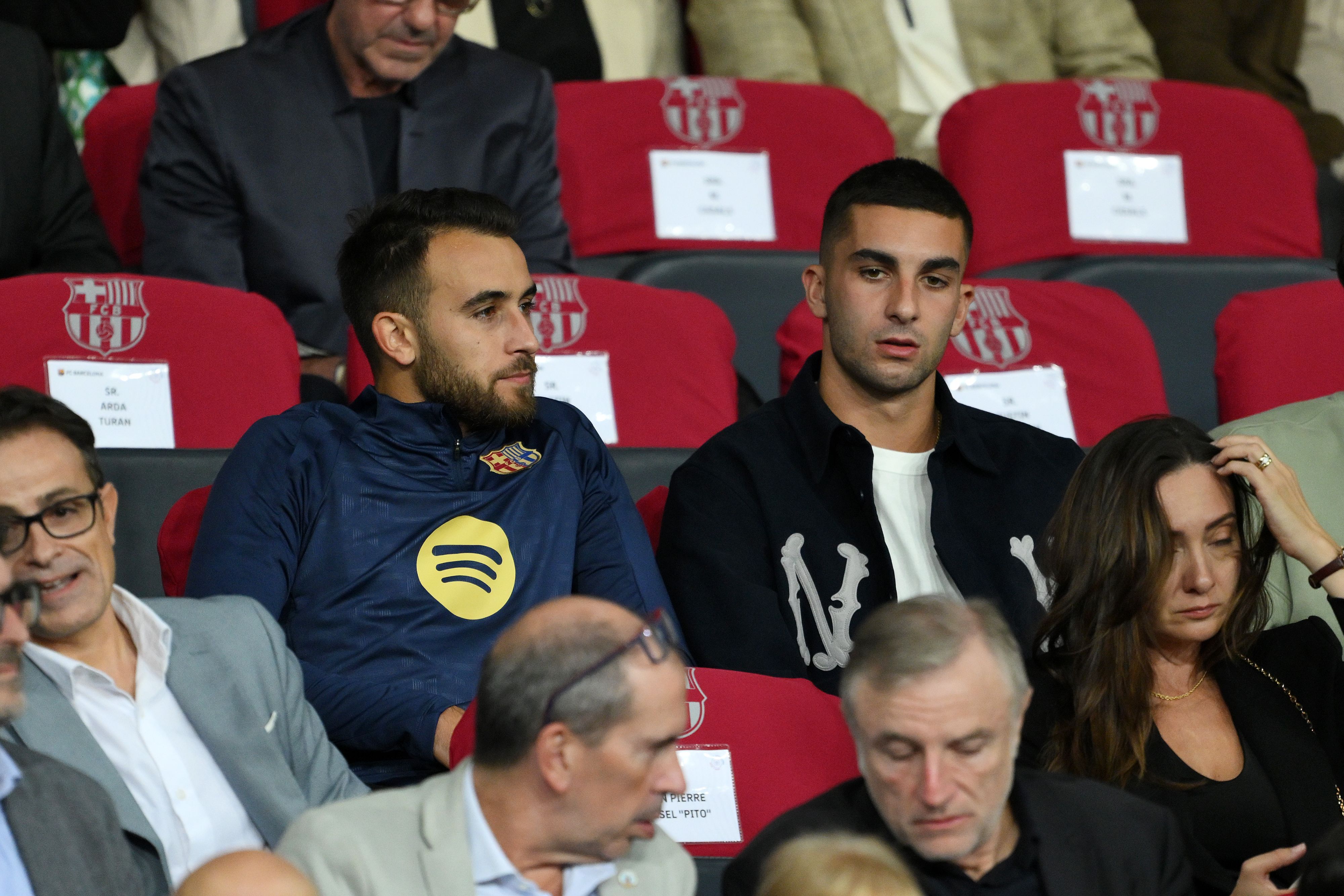 Eric Garcia and Ferran Torres of FC Barcelona watch on from the stands