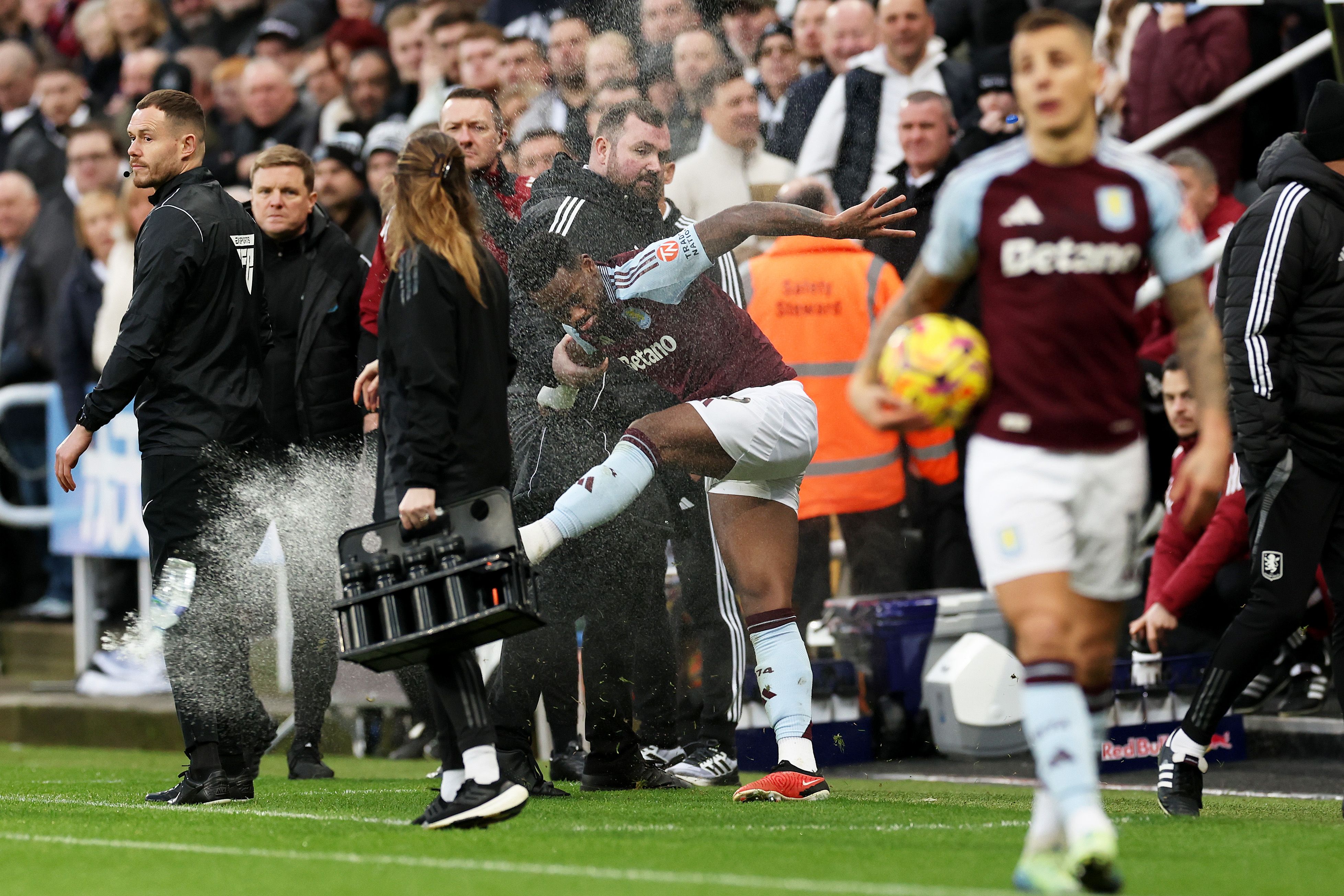 Jhon Duran of Aston Villa kicks a water bottle after receiving a red card