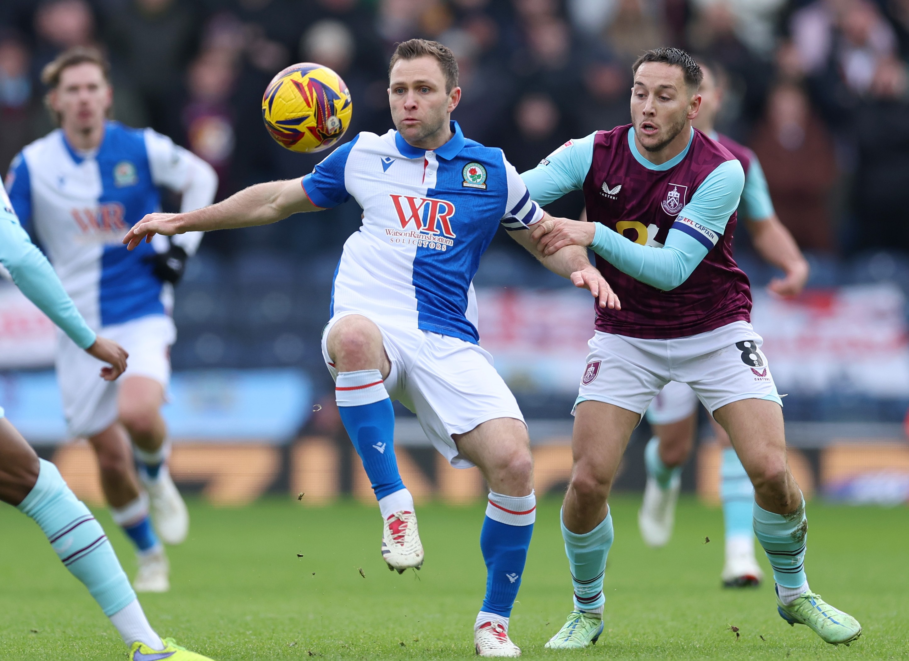 Sondre Tronstad of Blackburn Rovers is challenged by Josh Brownhill of Burnley. 