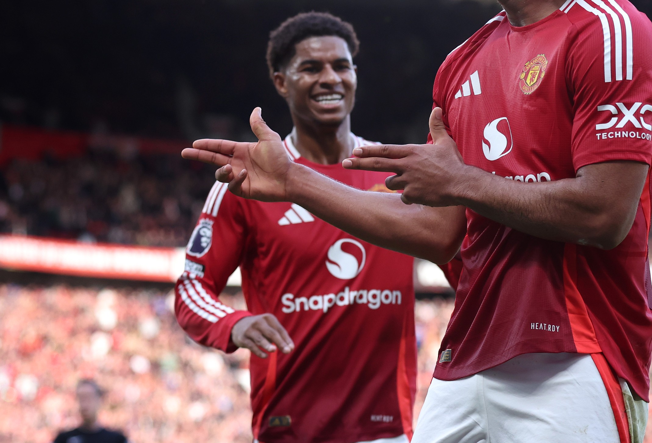 Joshua Zirkzee of Manchester United celebrates scoring his team's second goal with Marcus Rashford