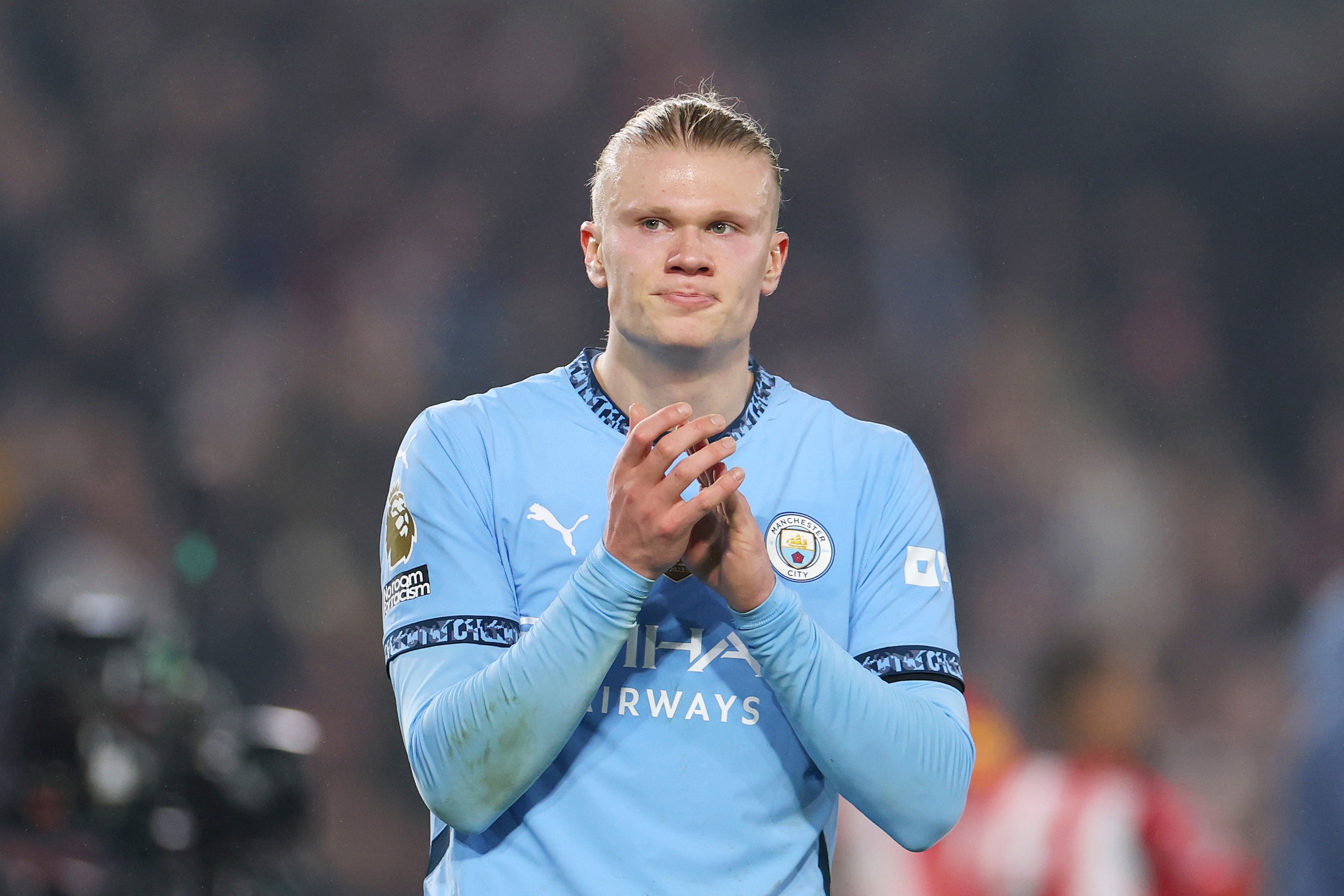 Erling Haaland of Manchester City applauds the fans