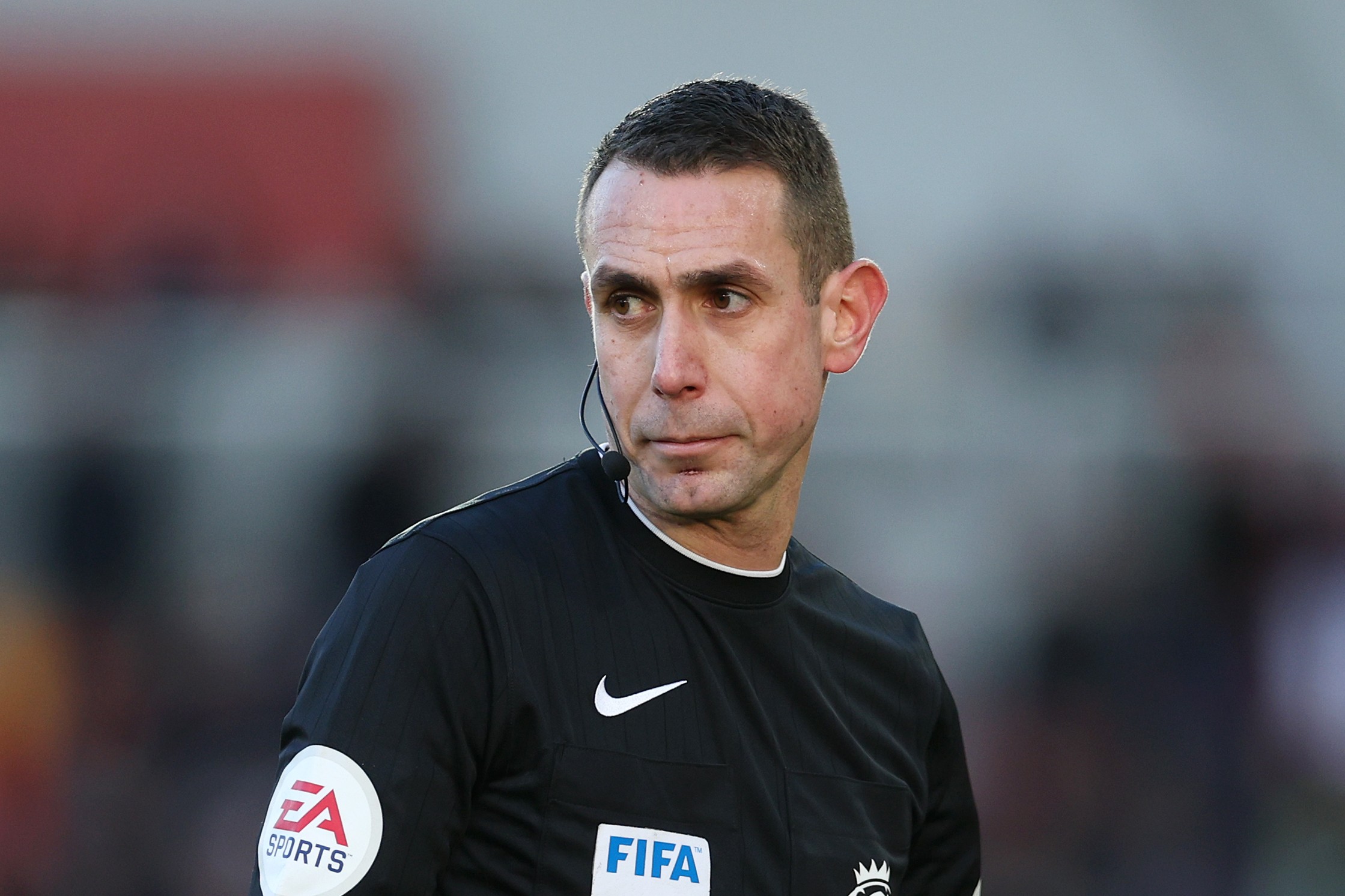 Match Referee, David Coote looks on