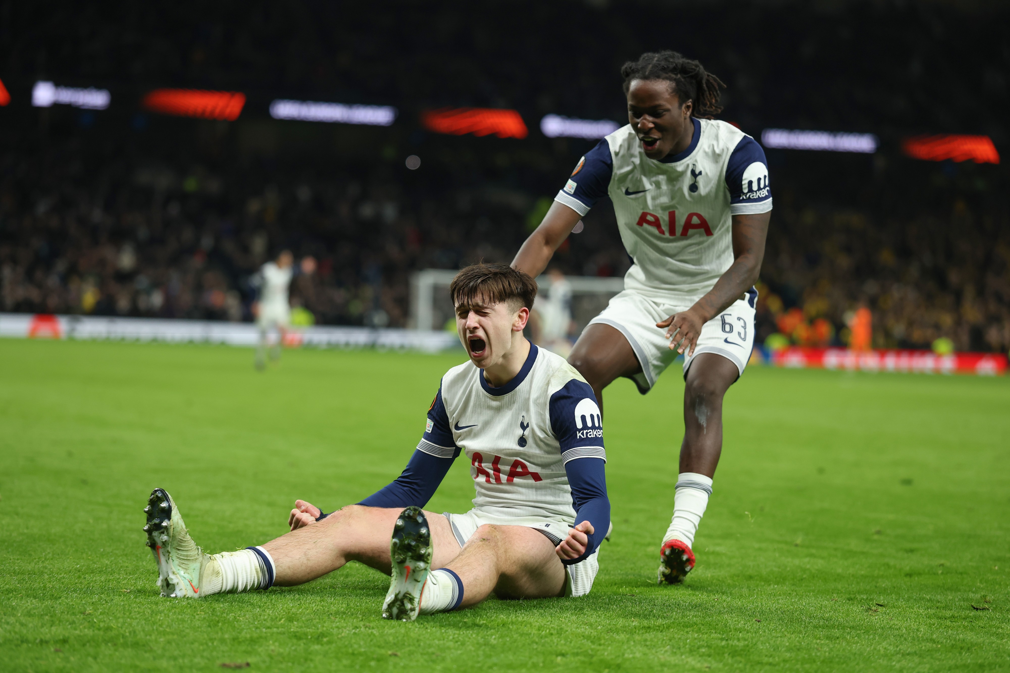 Mikey Moore and Oyindamola Ajayi of Tottenham celebrating a goal