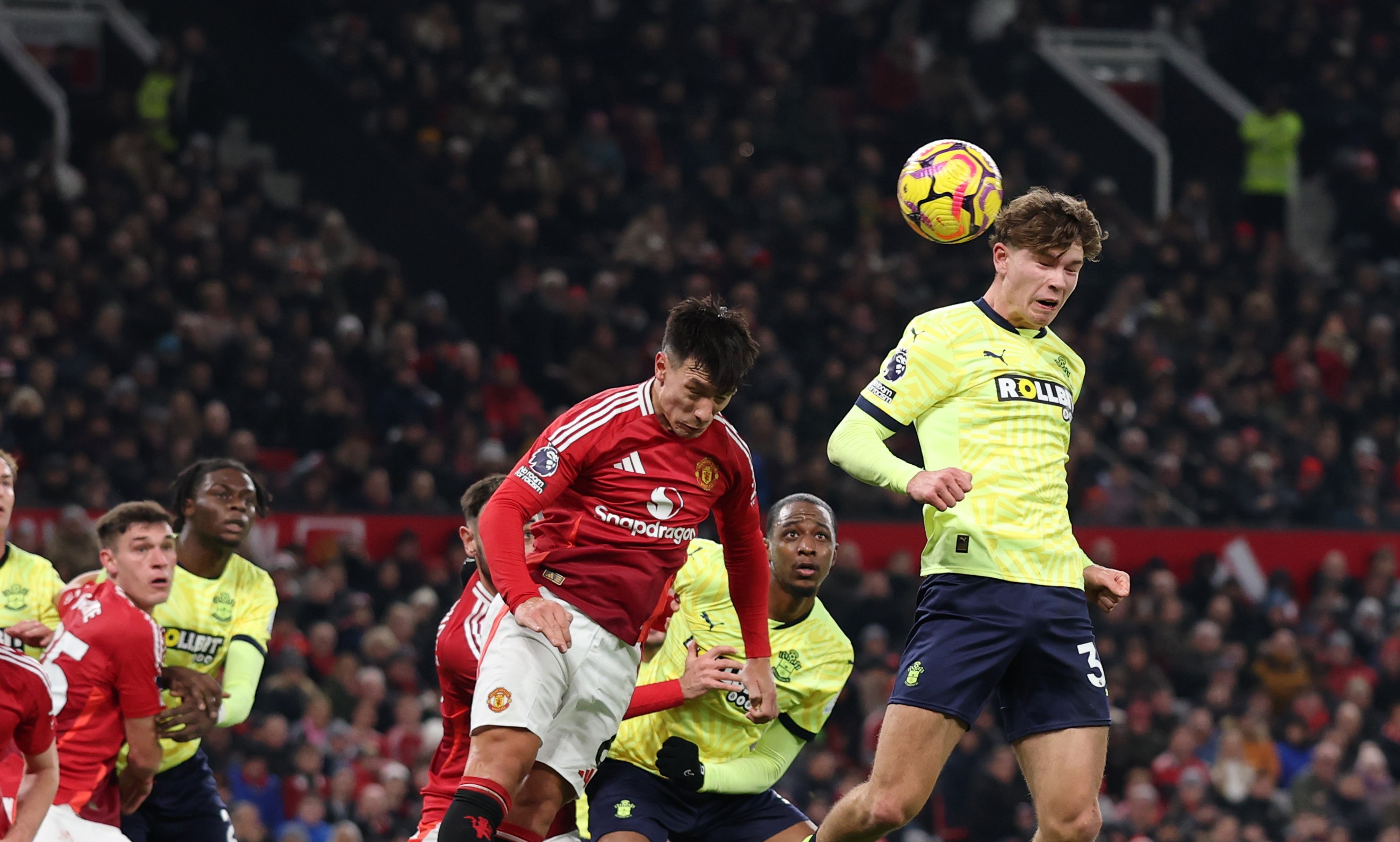 Southampton's Tyler Dibling has a header blocked by Manchester United's Manuel Ugarte.