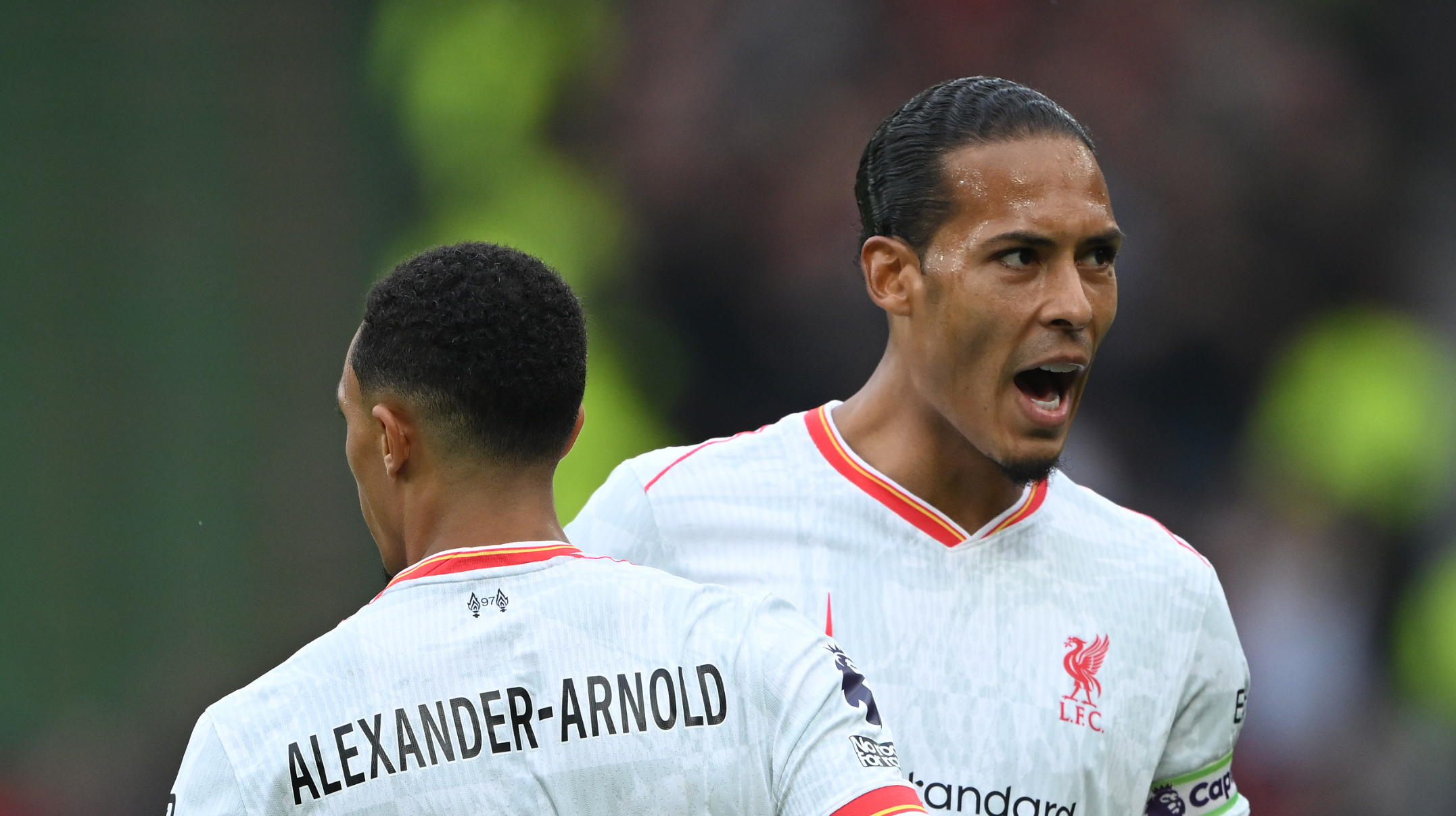 Trent Alexander-Arnold celebrates with Liverpool teammate Virgil van Dijk.