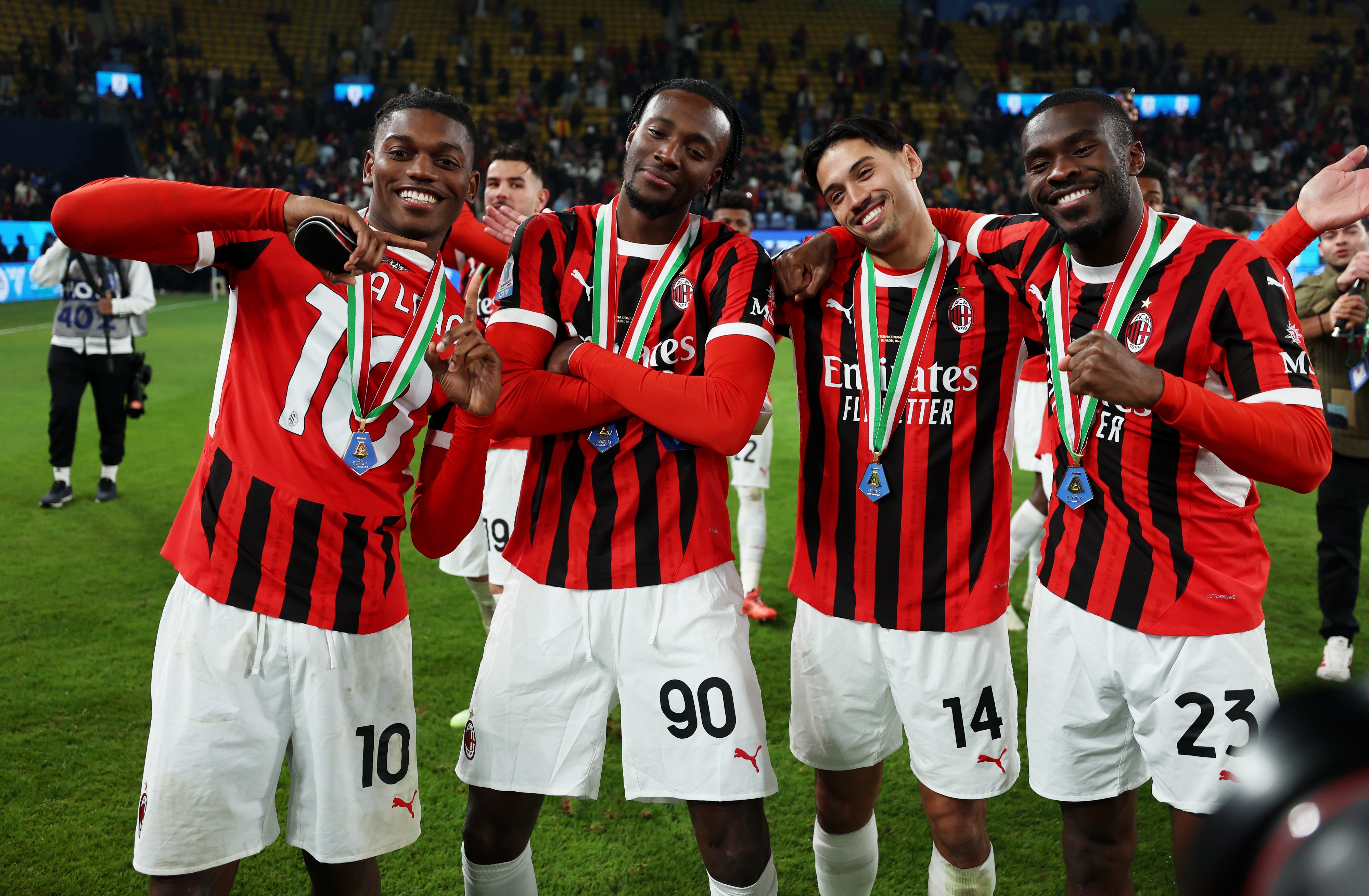 AC Milan's Rafael Leao, Tammy Abraham, Tijjani Reijnders and Fikayo Tomori celebrate the win