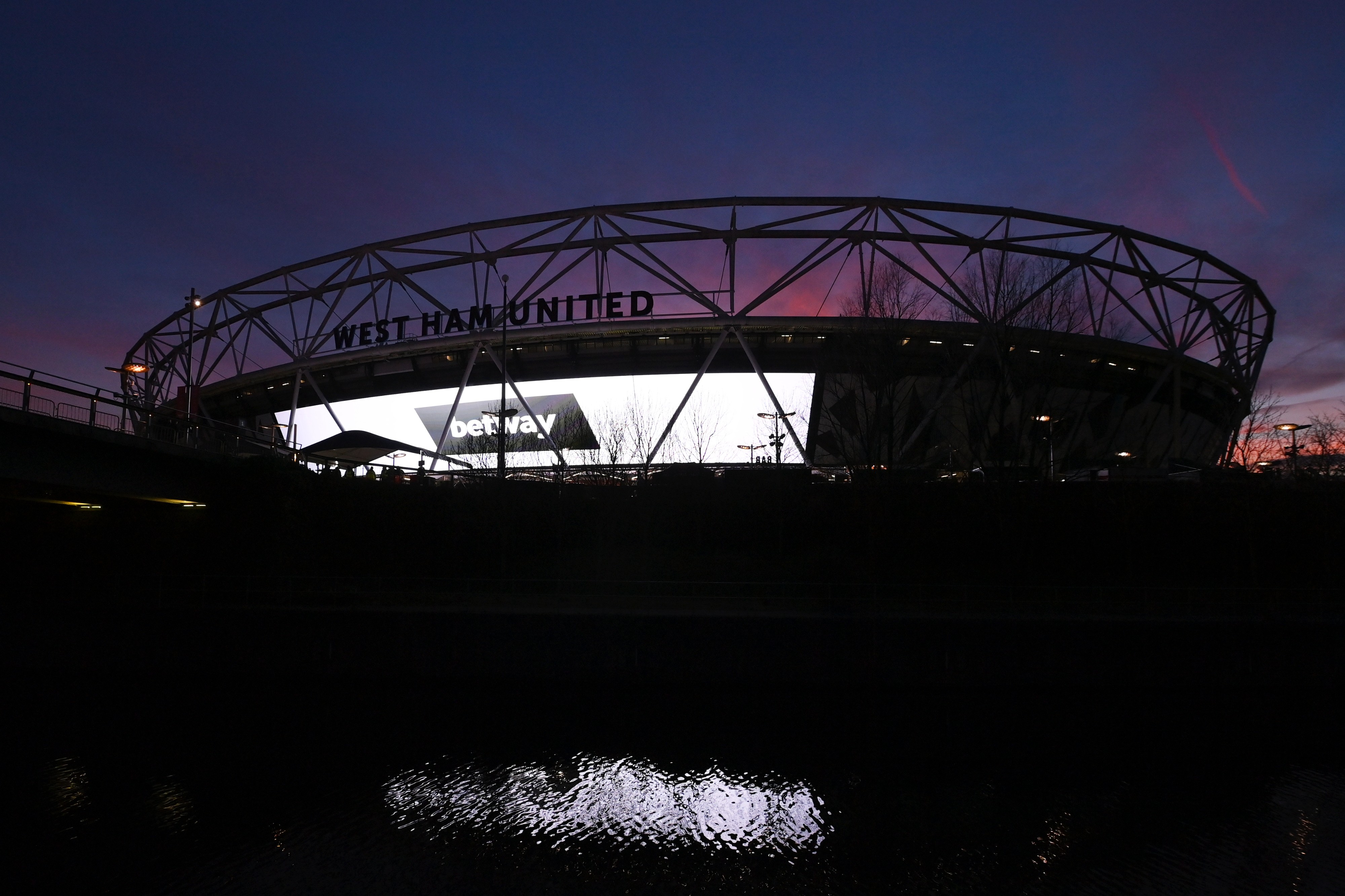 A general view as the sun sets over the London Stadium