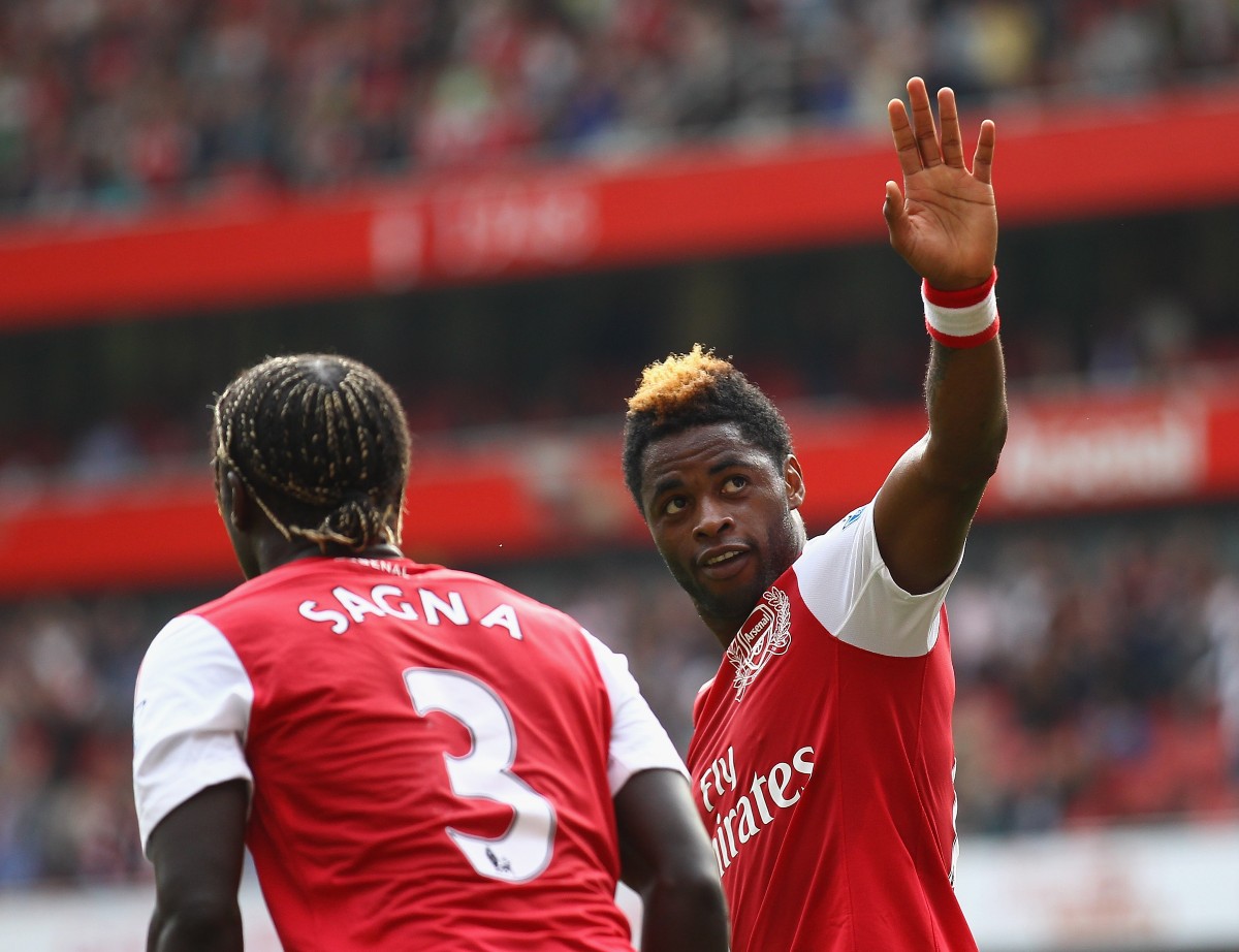 Alex Song waves to the Arsenal fans at the Emirates Stadium