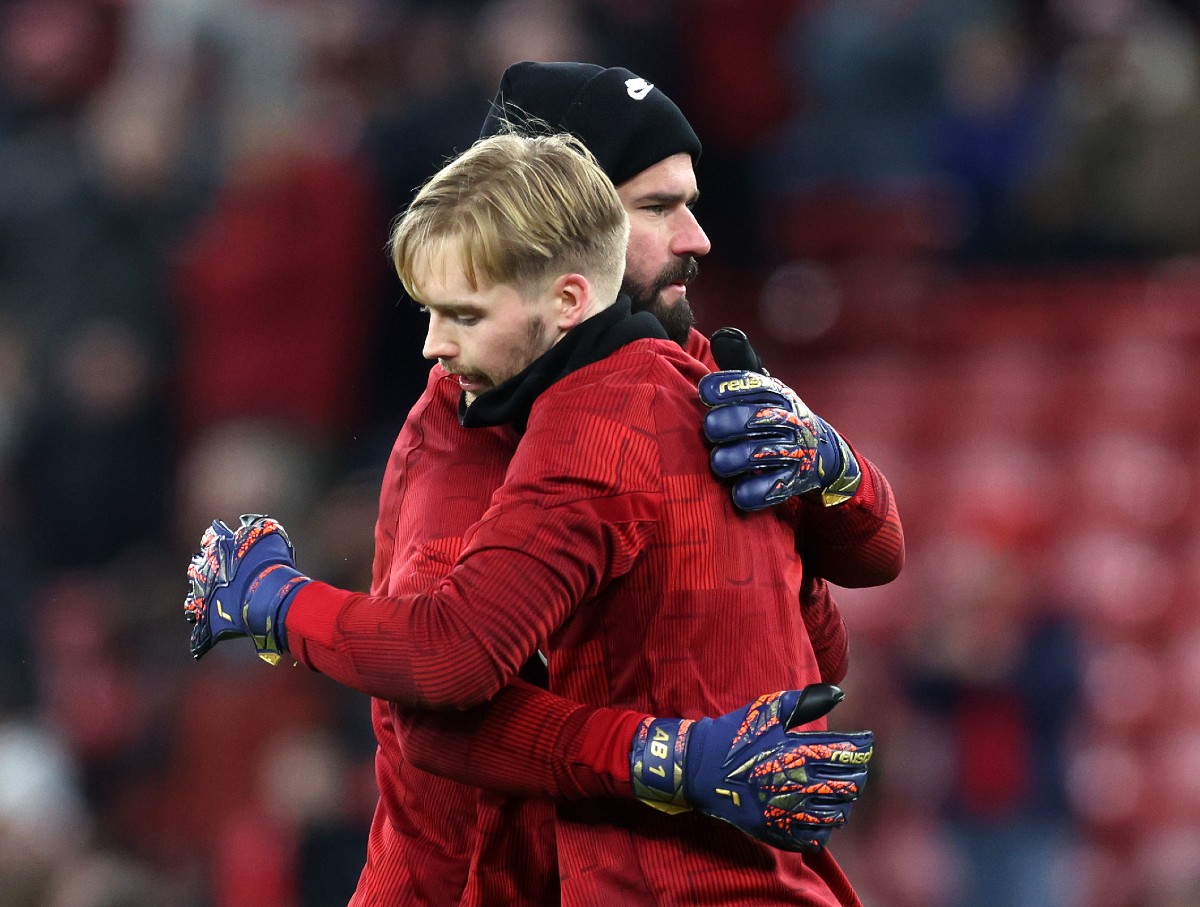 Alisson hugging Caoimhin Kelleher