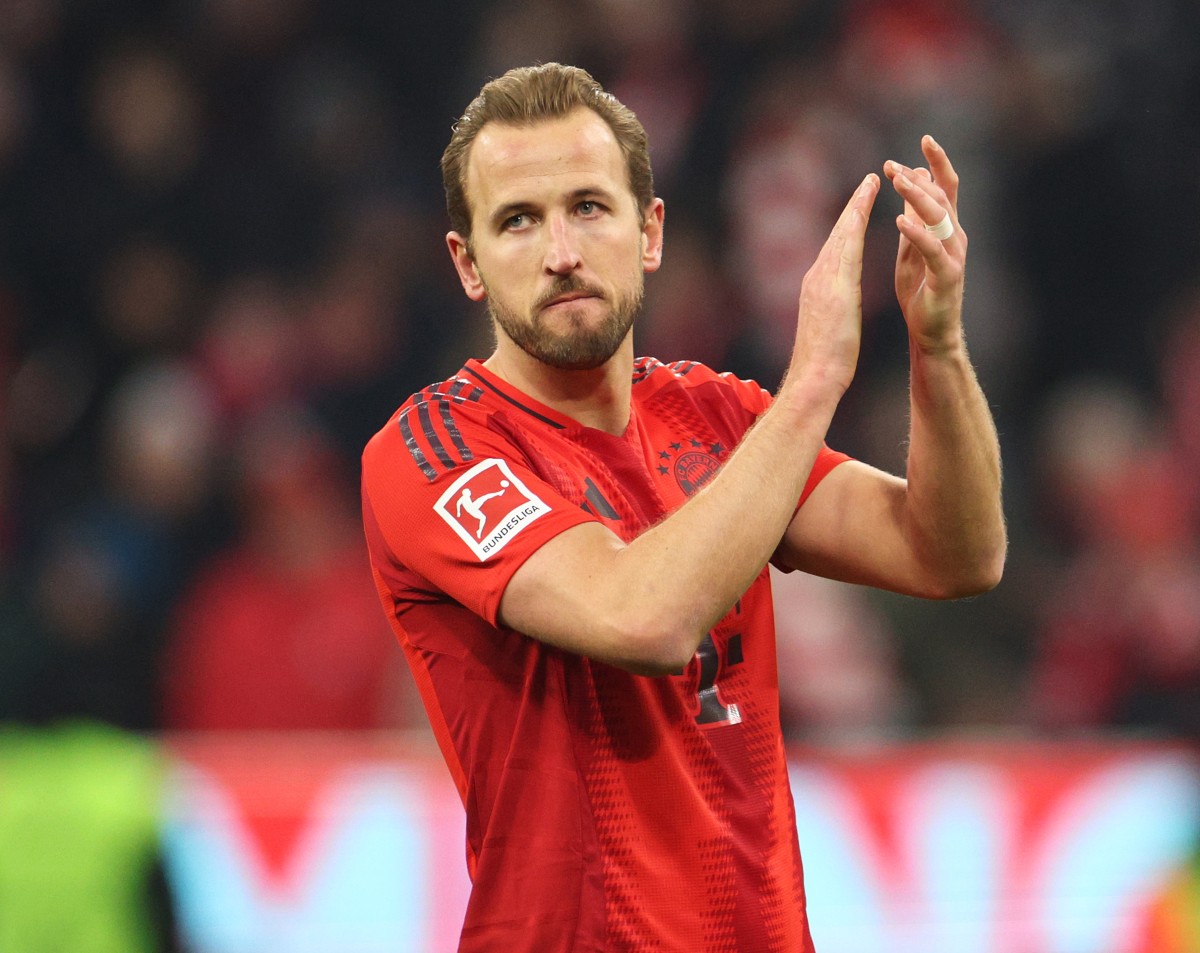 Harry Kane applauds the Bayern Munich fans