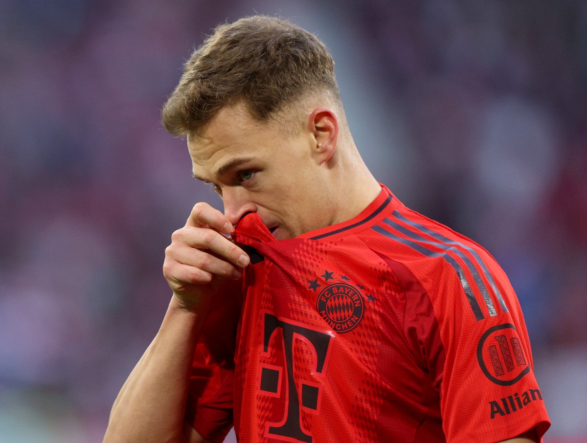 Joshua Kimmich at work for Bayern, wipes his nose with his shirt