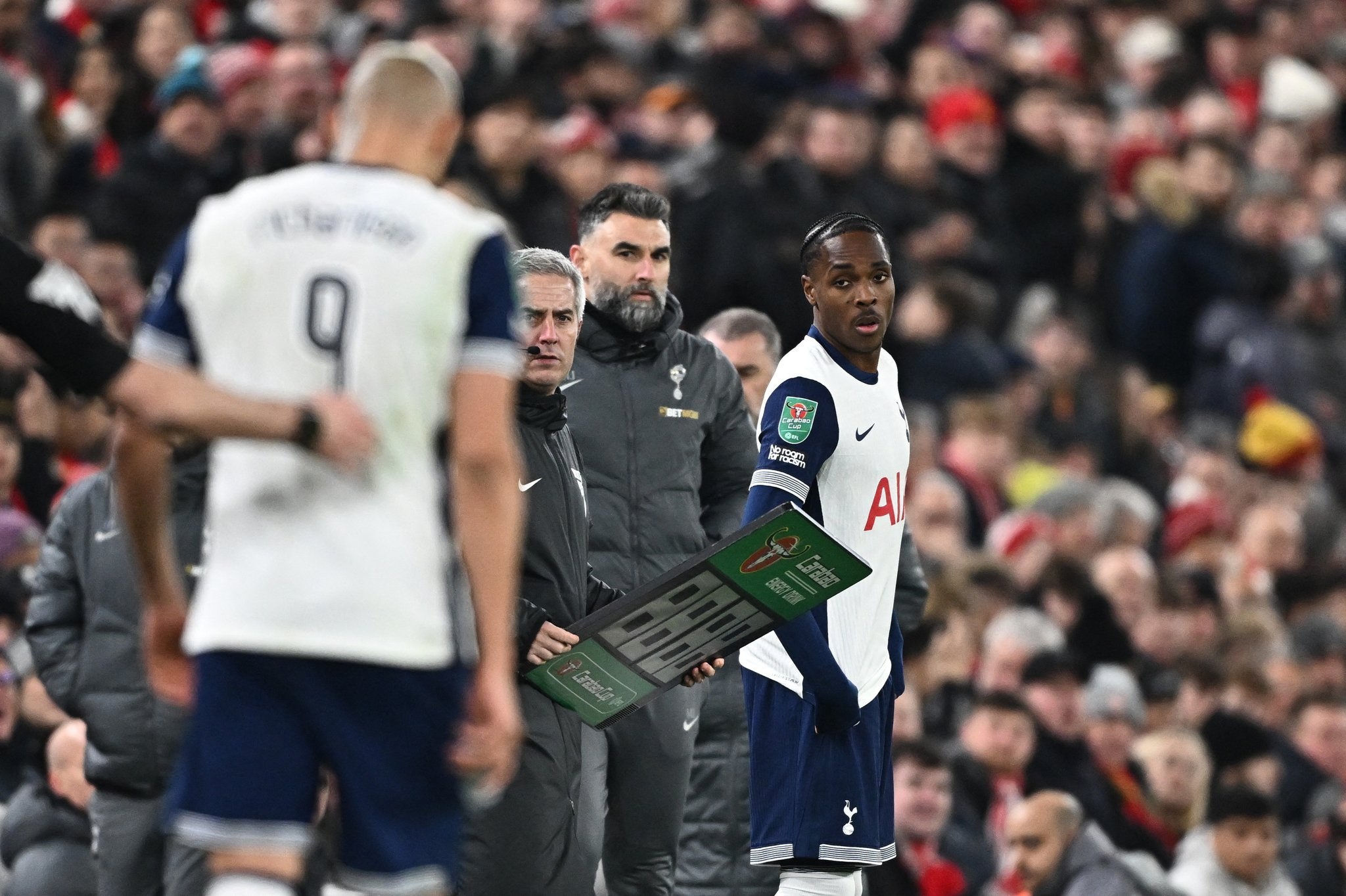 Mathys tell waits to be subbed on at Anfield.