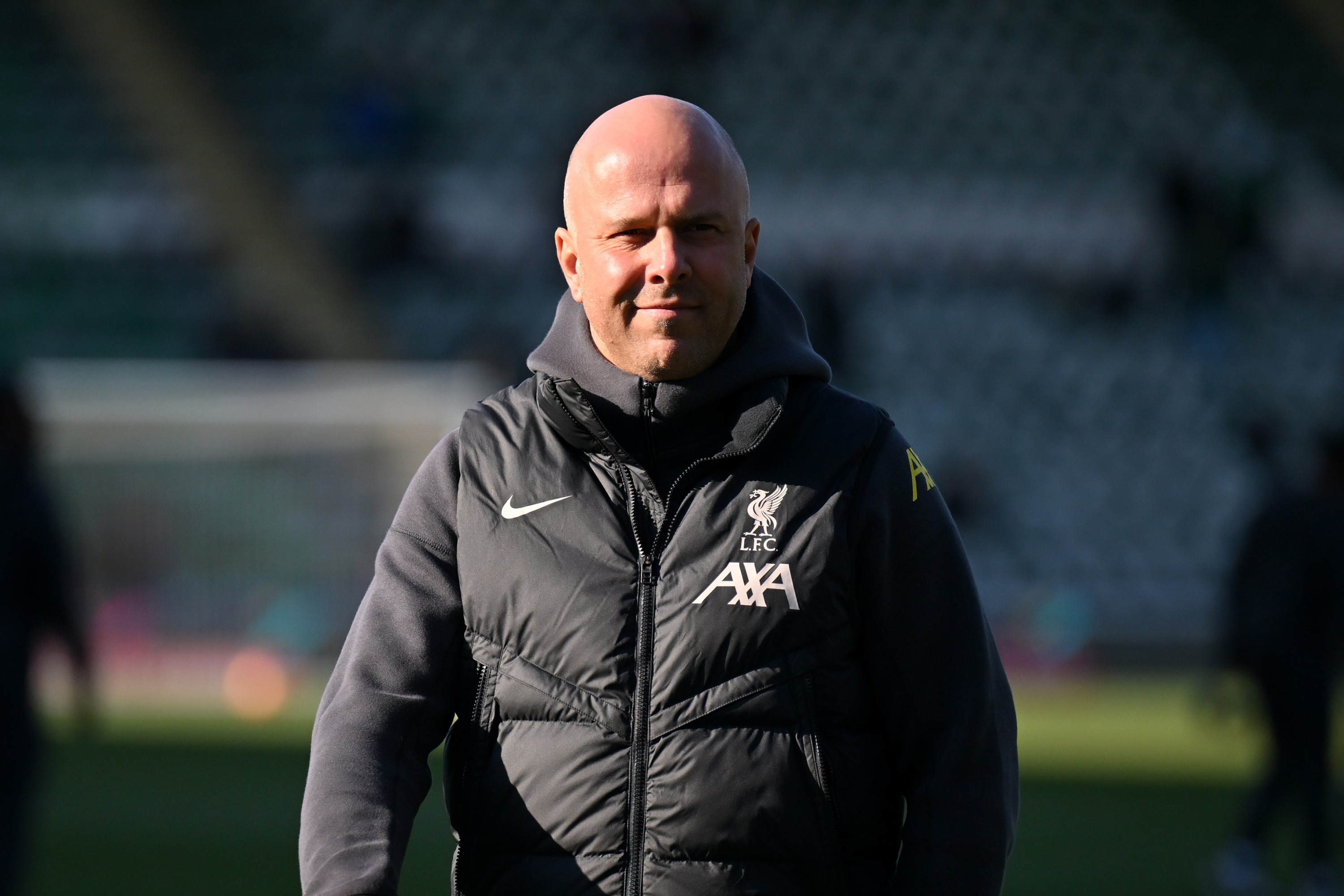 Arne Slot, Manger of Liverpool, look, during a pitch inspection