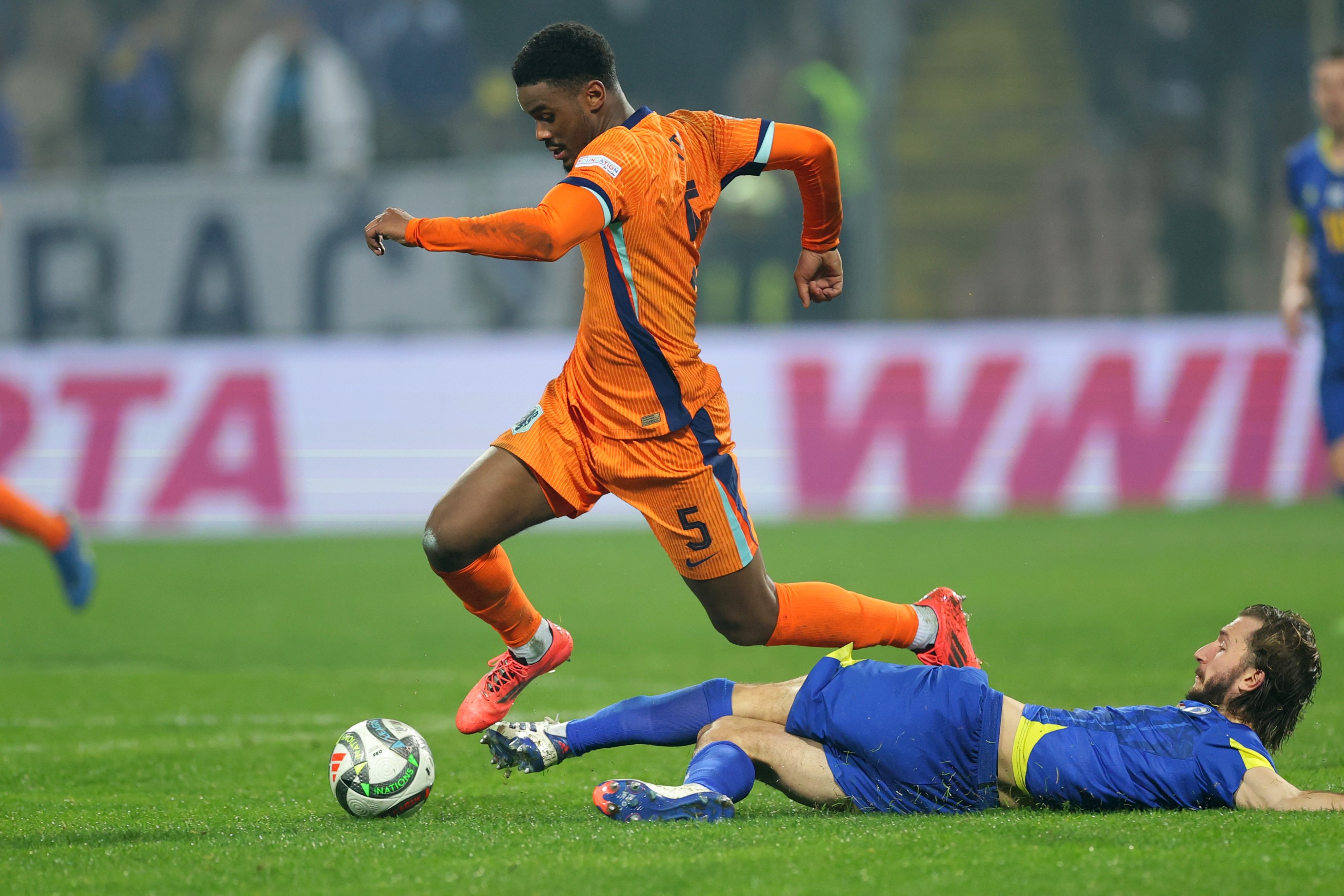 Jorrel Hato of Netherlands (L) vies with Ivan Sunjic of Bosnia