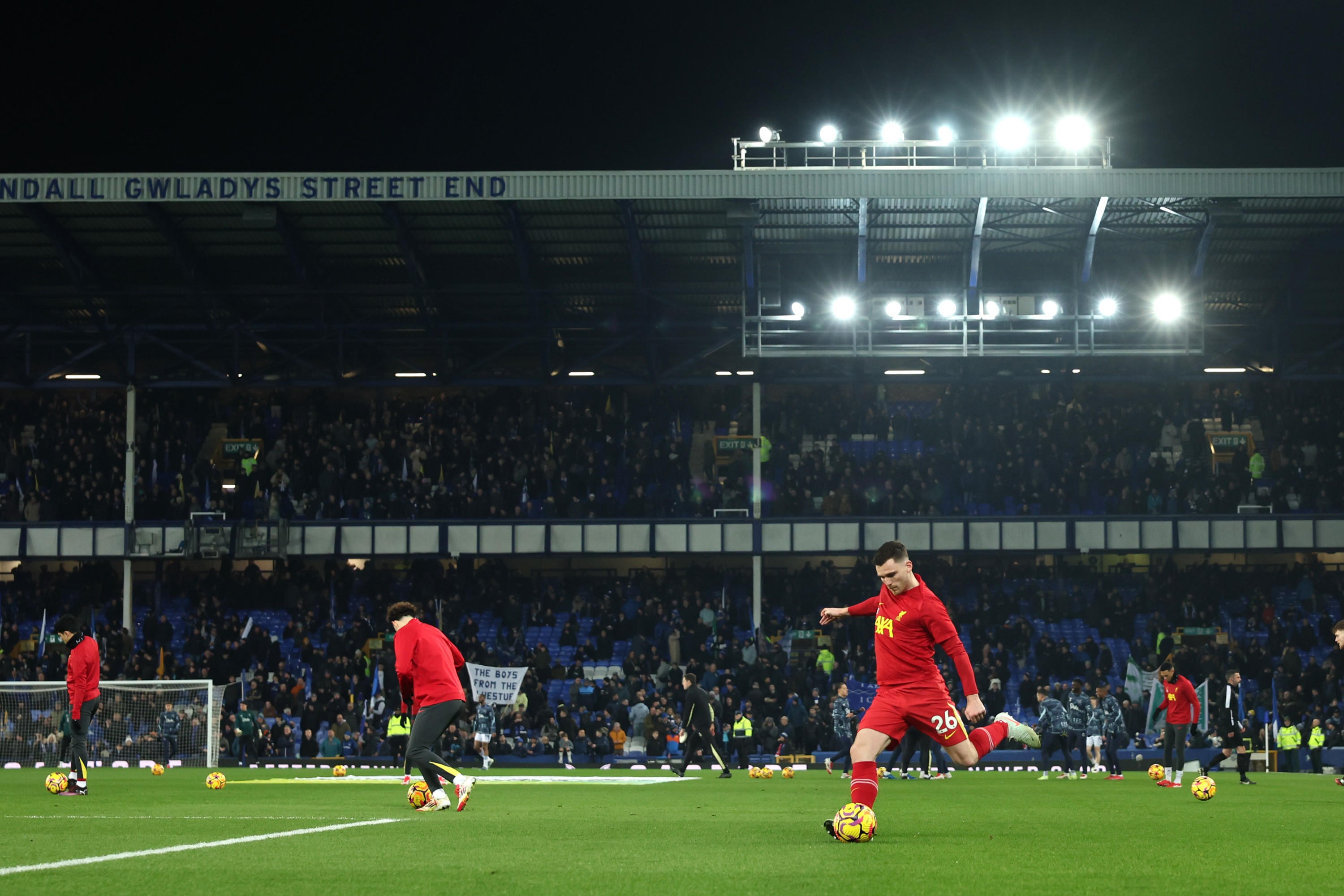 Andrew Robertson, by Liverpool, warms up before the Premier League party between Everton FC and Liverpool FC