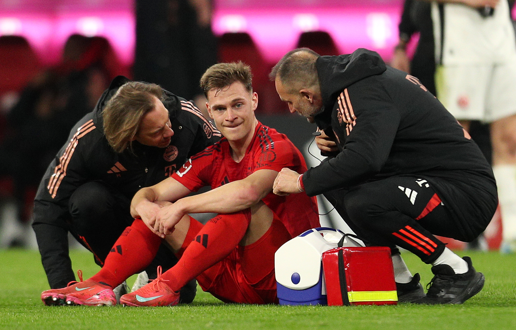 Joshua Kimmich of Bayern Munich receives treatment