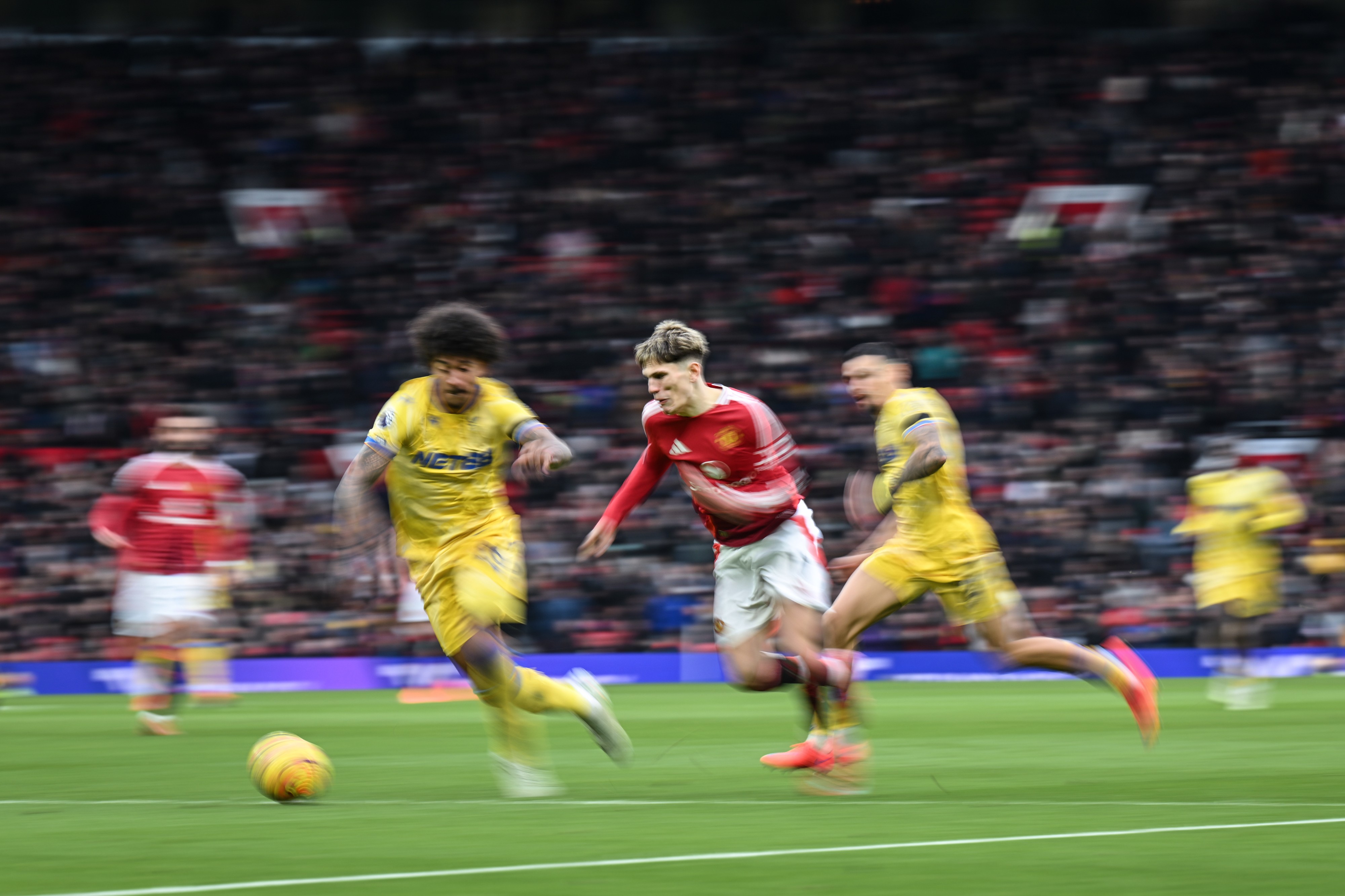 Chris Richards and Daniel Munoz of Crystal Palace and Alejandro Garnacho of Manchester United in action during the Premier League match