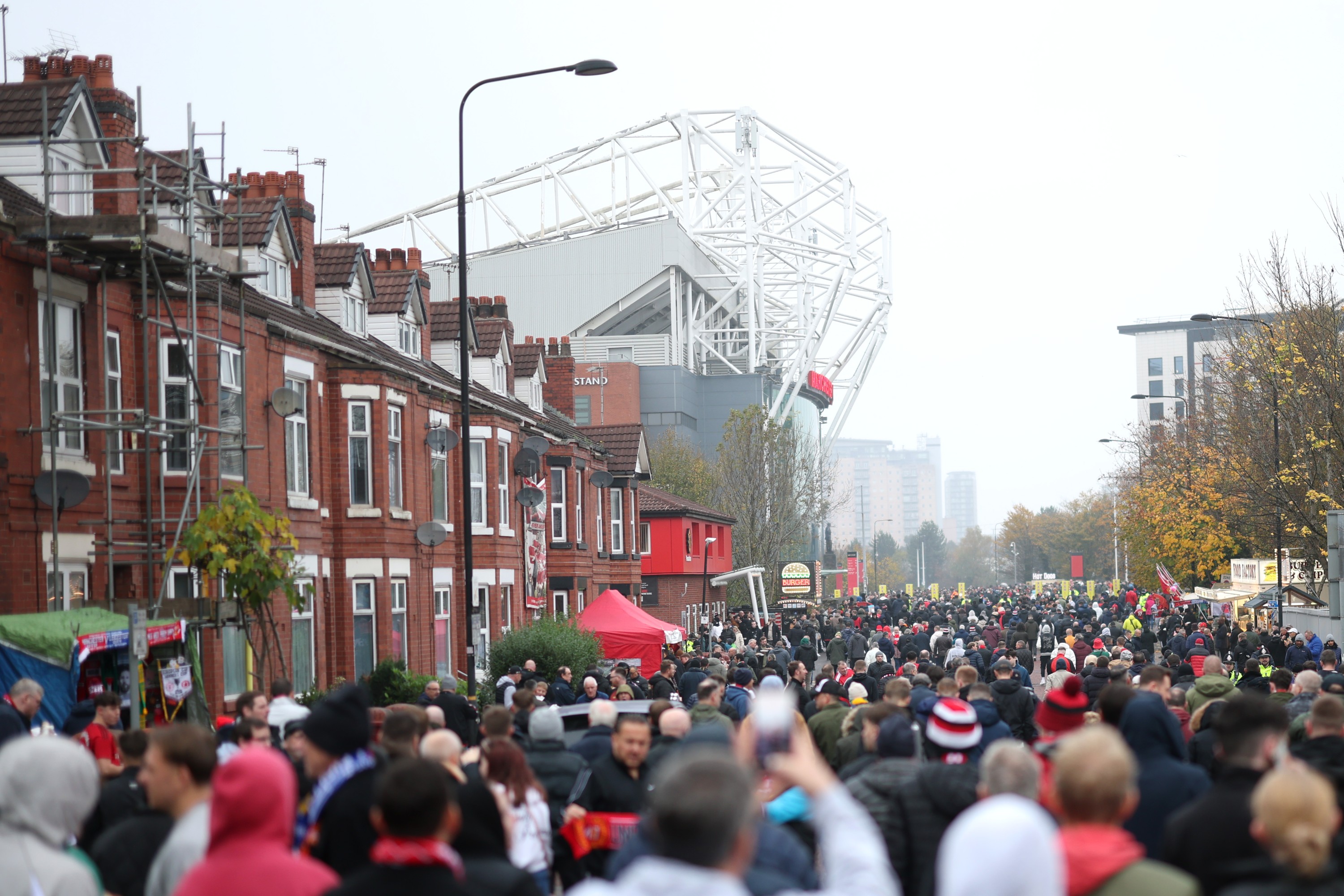 General view outside the stadium as fans make their way towards Old Trafford