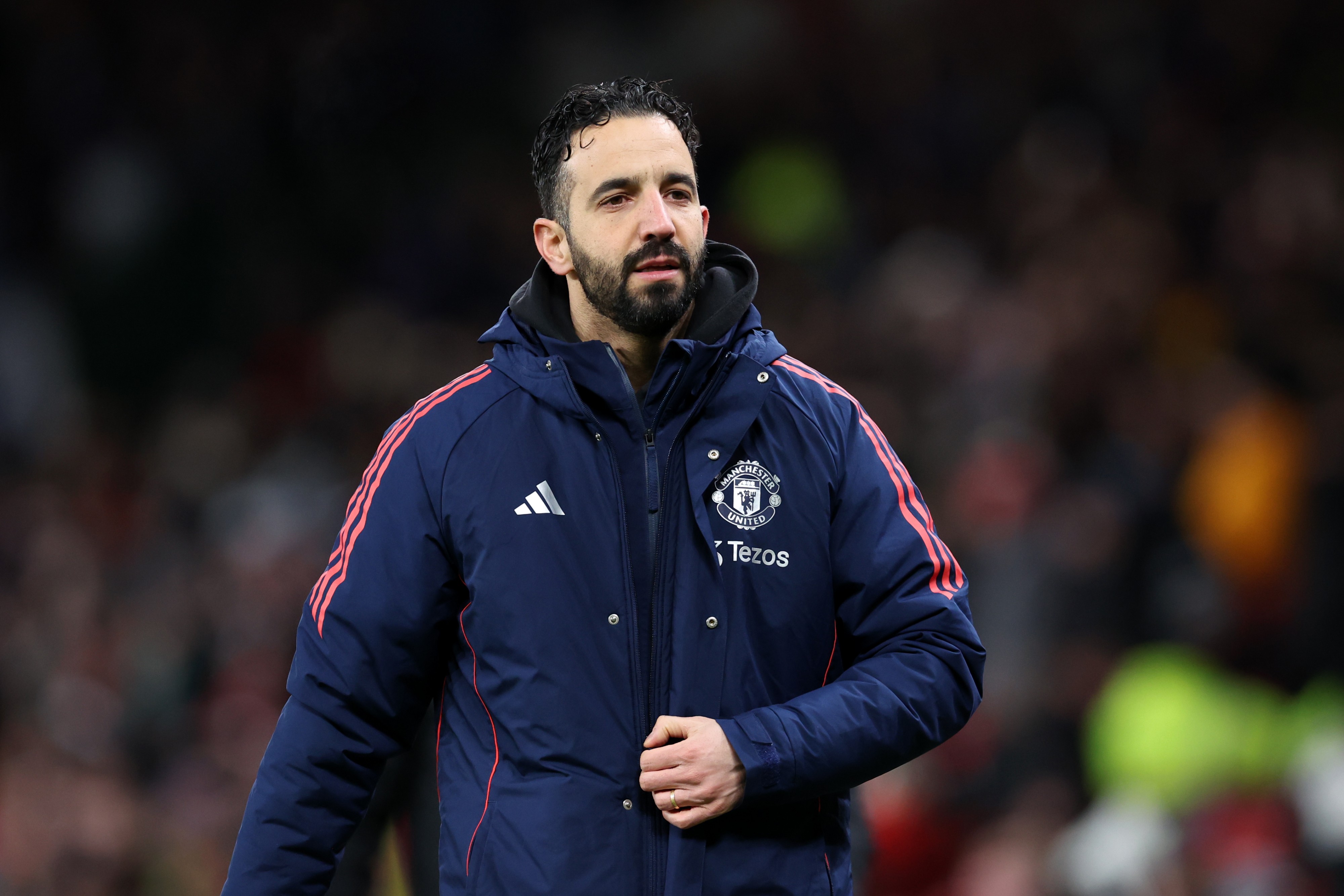 Ruben Amorim, Manager of Manchester United, looks on