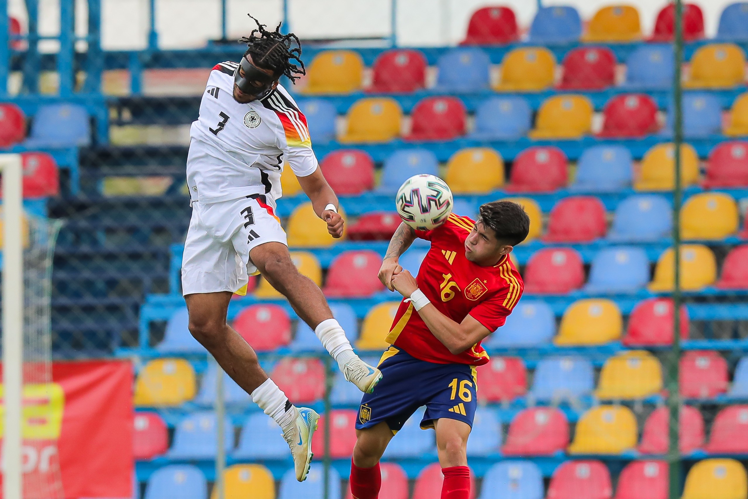 Almugera Kabar (L) of U19 Germany jumps to the ball with Antonio Cordero