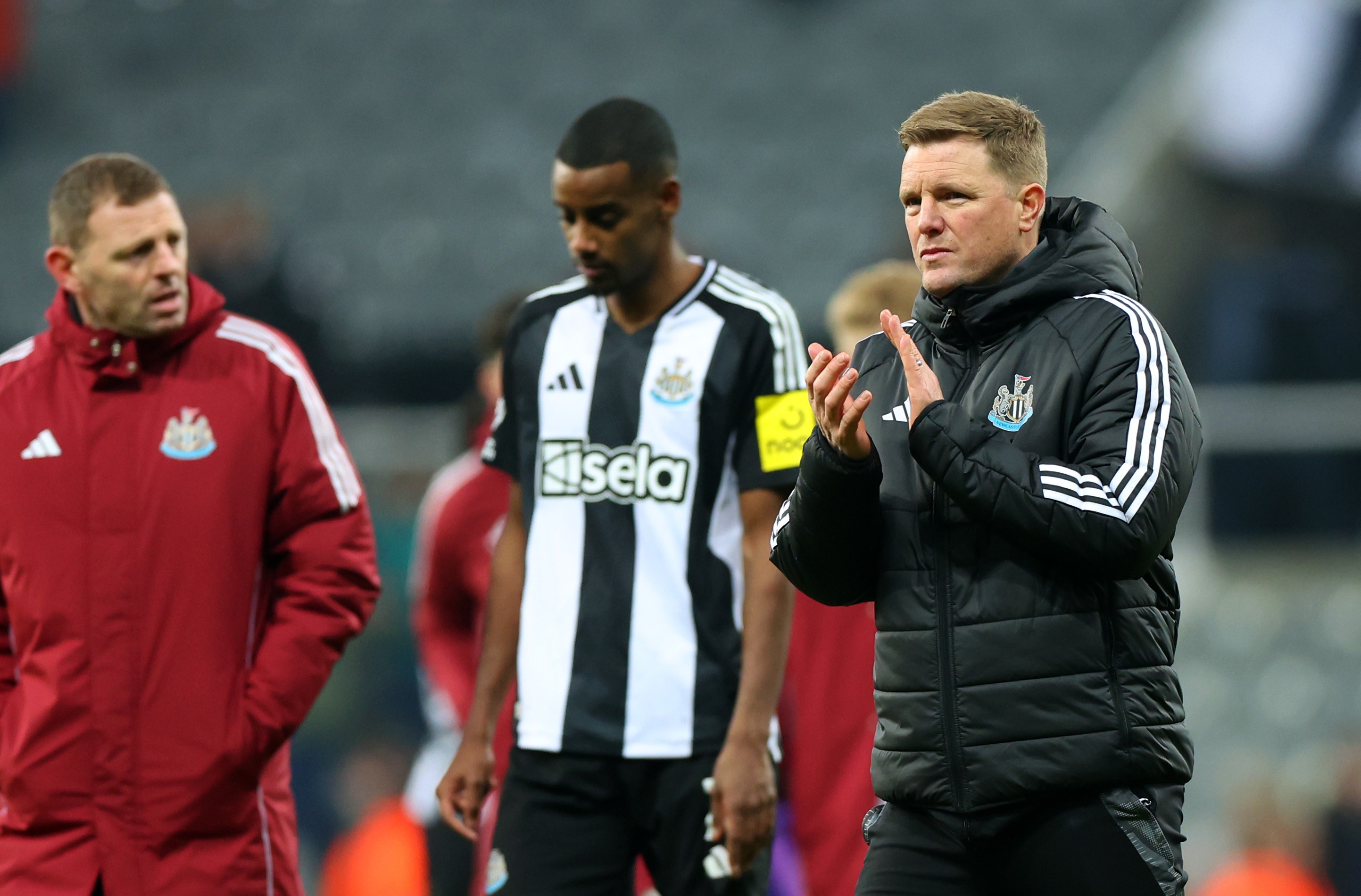 Eddie Howe, manager of Newcastle United, applaud the fans