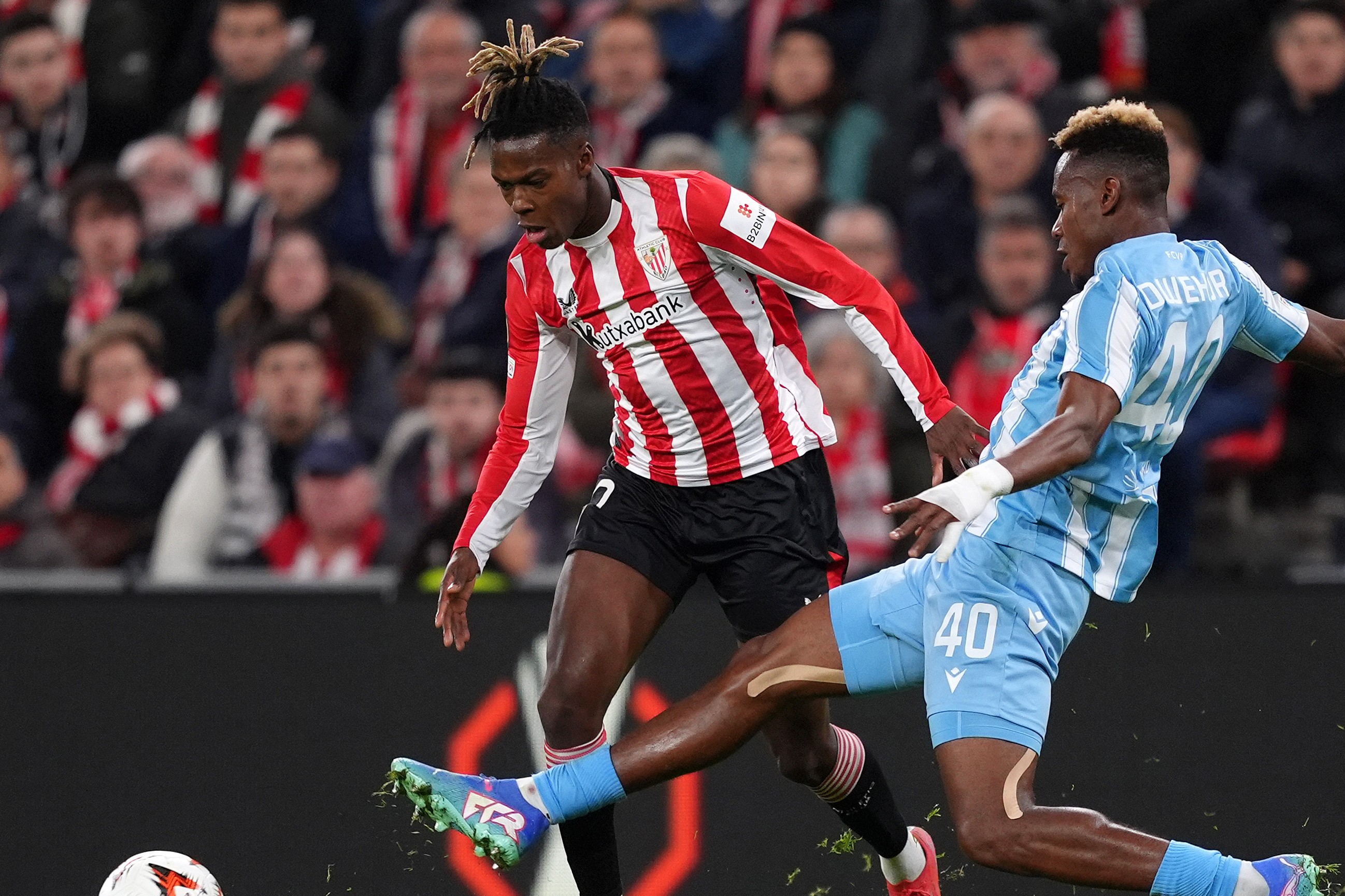 Nico Williams of the Athletic Club is under pressure under Sampson Dweh of the FC Viktoria Plzen during the MD8 phase of UEFA Europa League 2024/25.