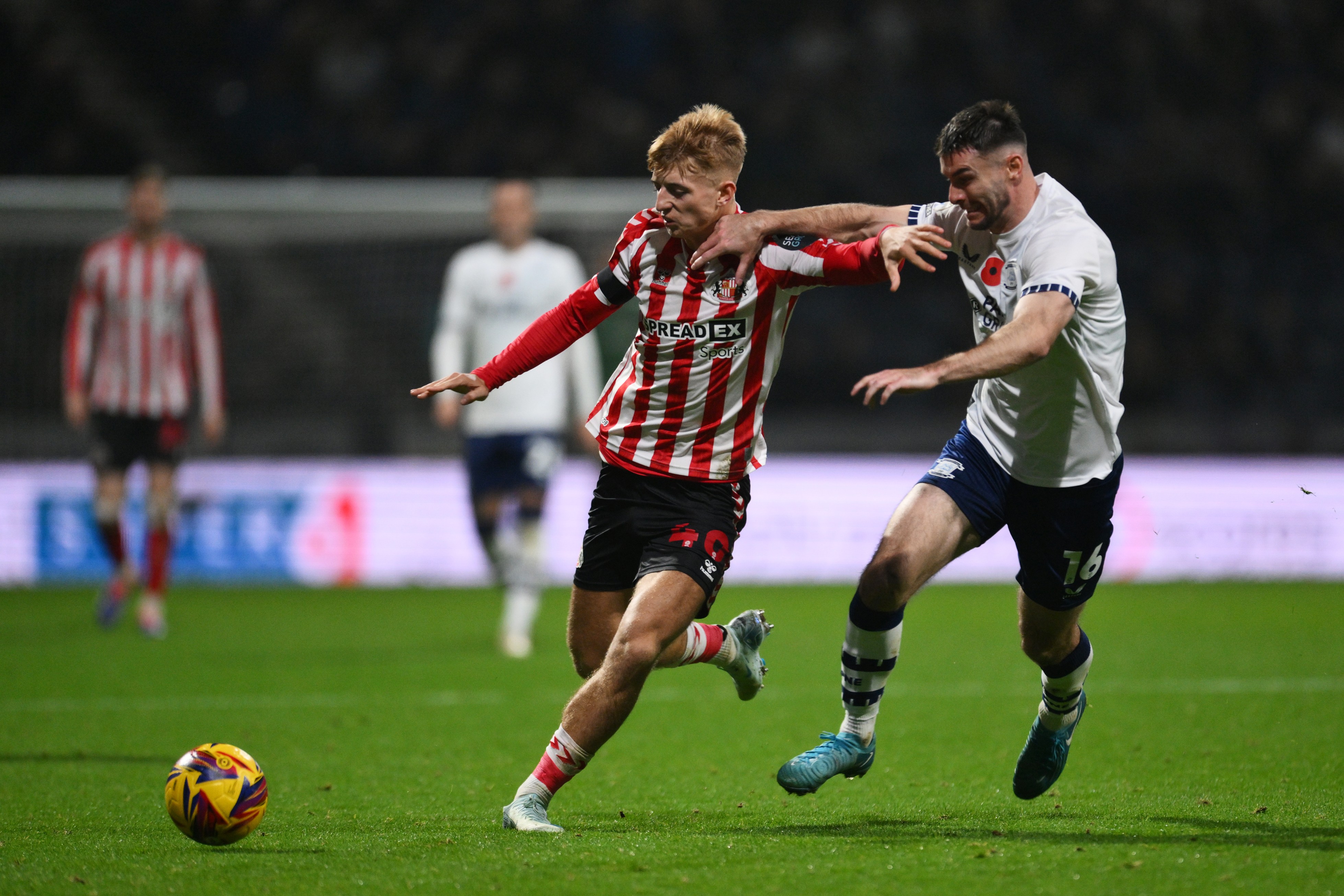 Tom Watson runs with the ball