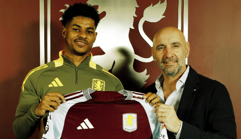 Marcus Rashford holding an Aston Villa shirt