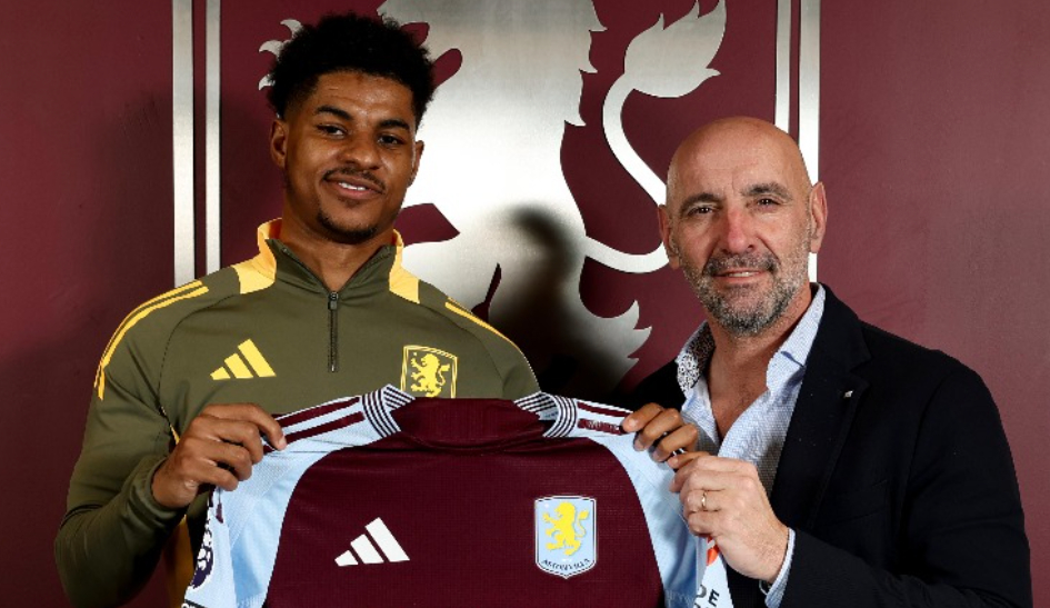 Marcus Rashford holding an Aston Villa shirt. 