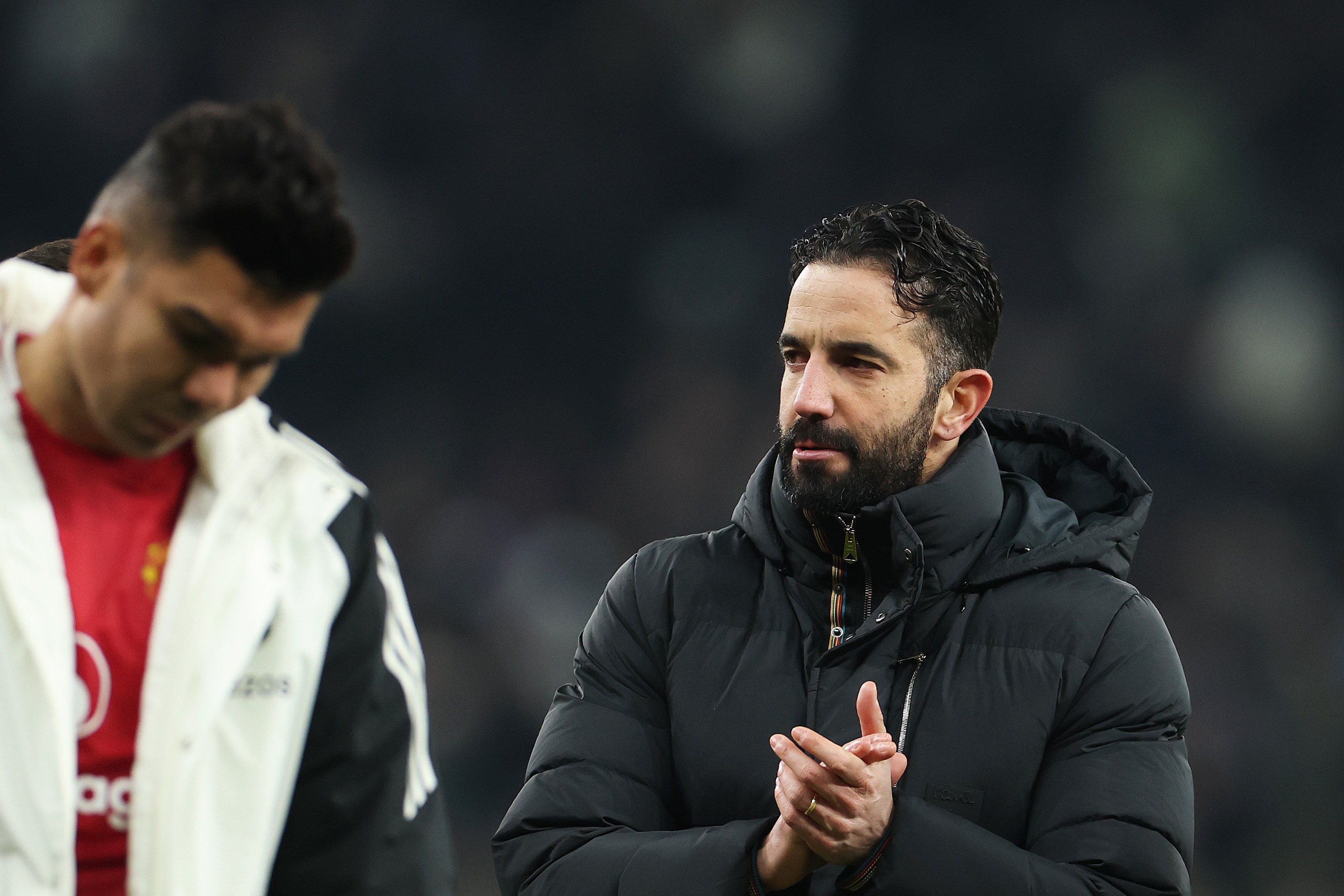 Ruben Amorim, Manager of Manchester United, applauds the fans after the team's defeat against Tottenham Hotspur