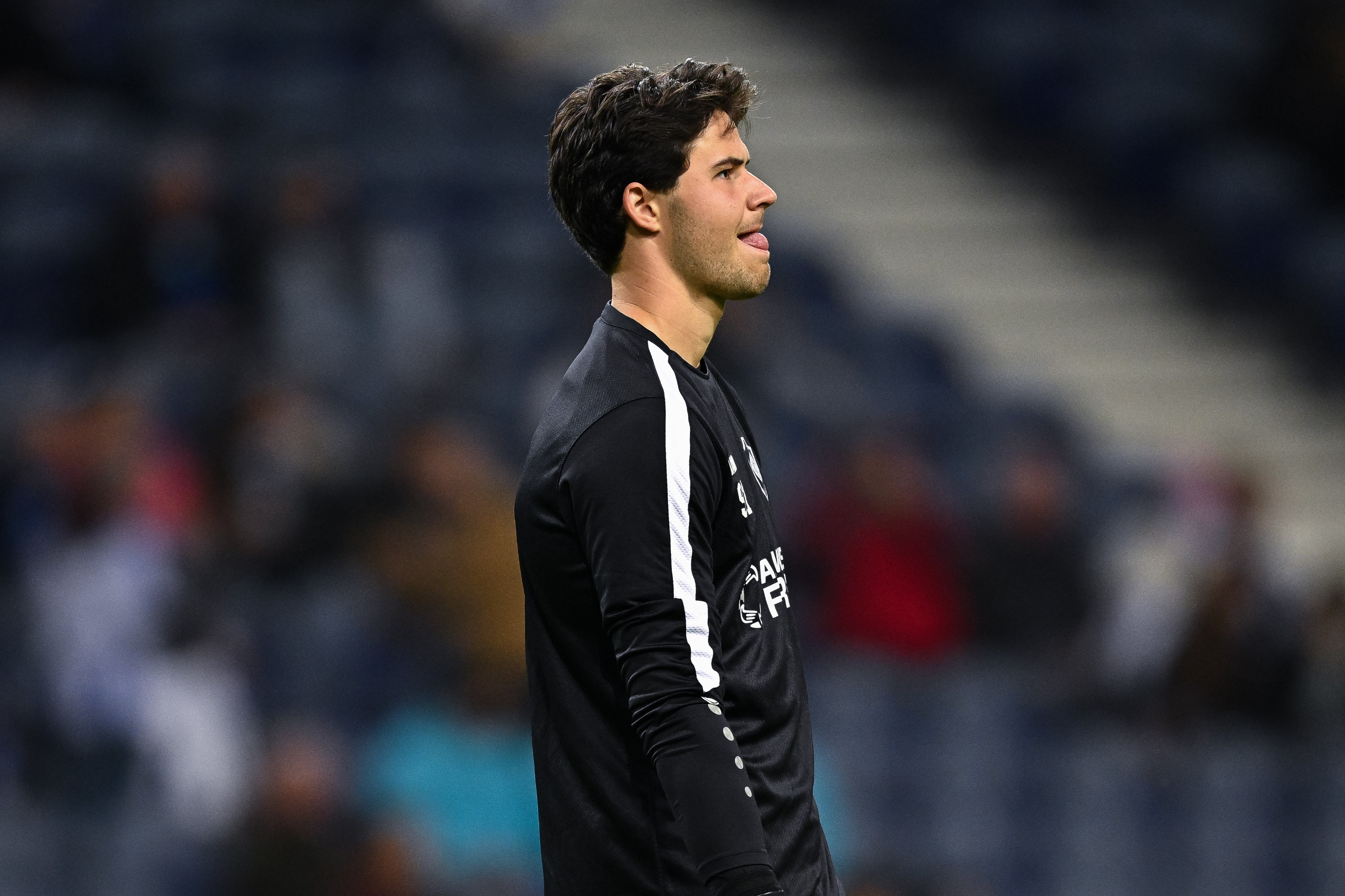 Senne Lammens of Royal Antwerp FC in action against FC Porto.