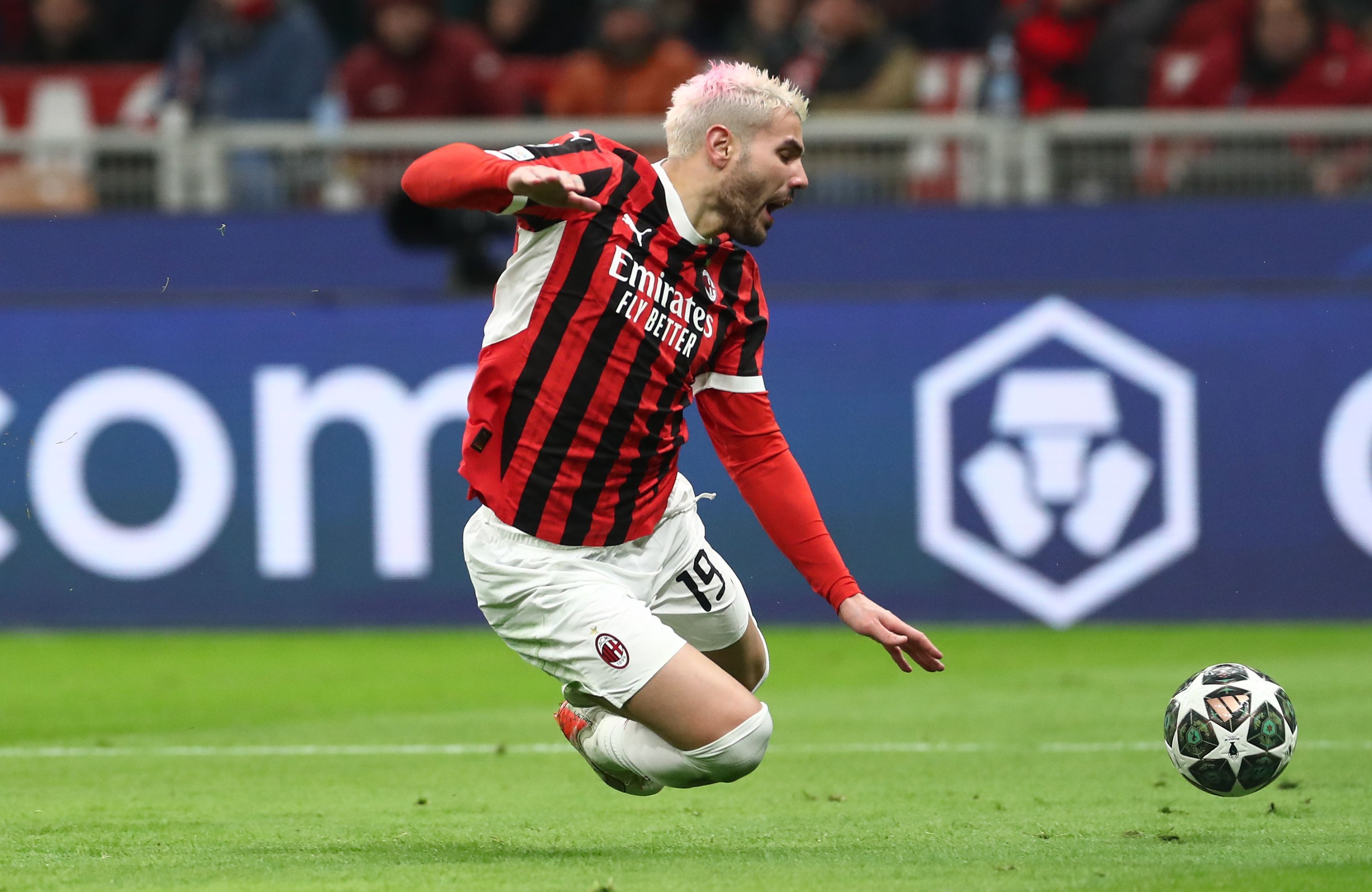 Theo Hernandez of AC Milan dives ahead of receiving a red card