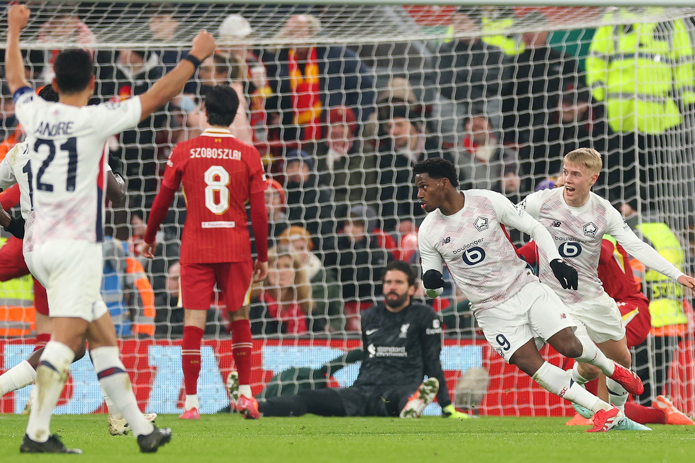 Lille's Jonathan David celebrates the achievement of his team's first goal during the UEFA Champions League match against Liverpool on Anfield