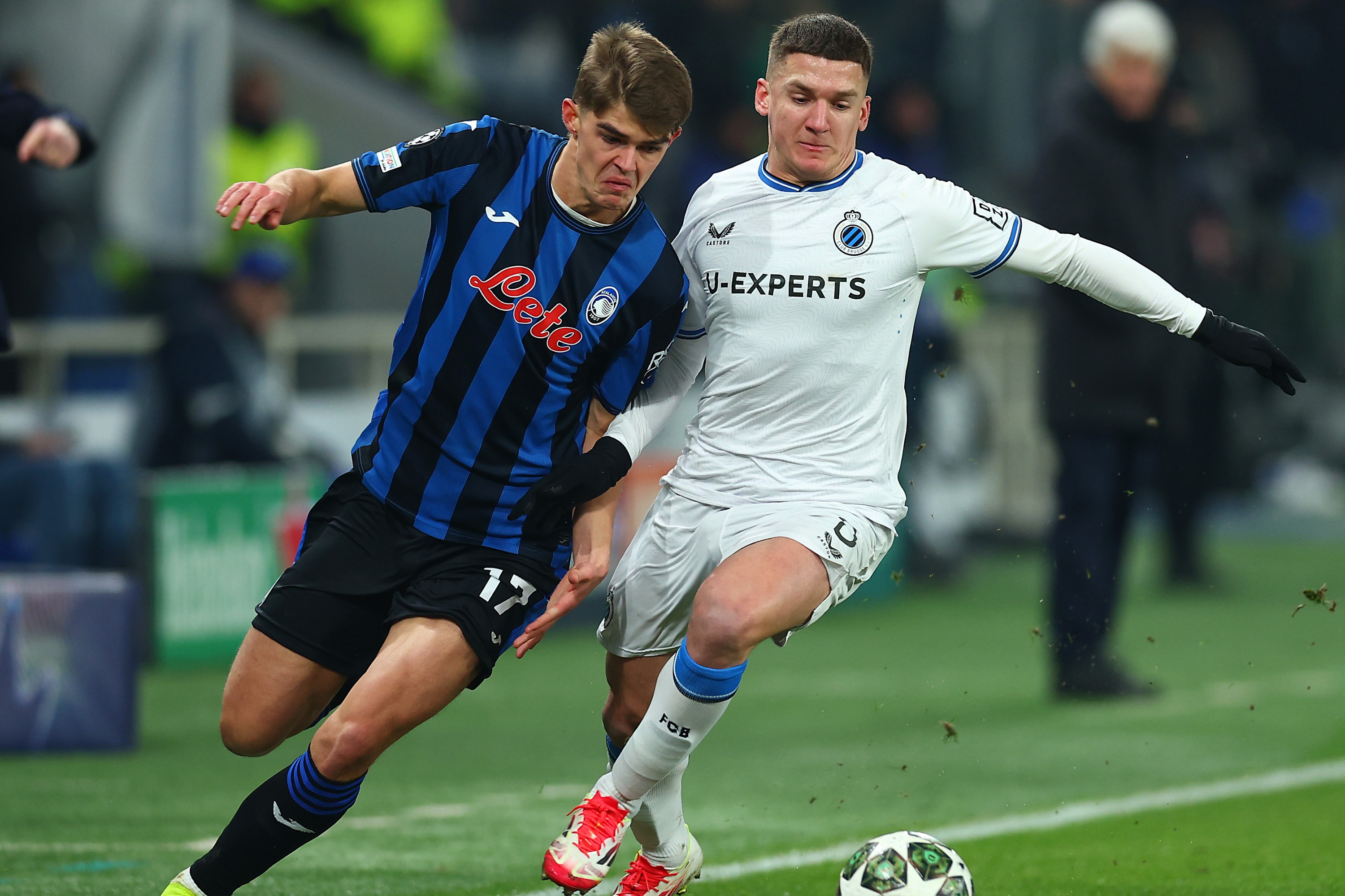 Christos Tzolis of Club Brugge is challenged by Charles De Ketelaere of Atalanta