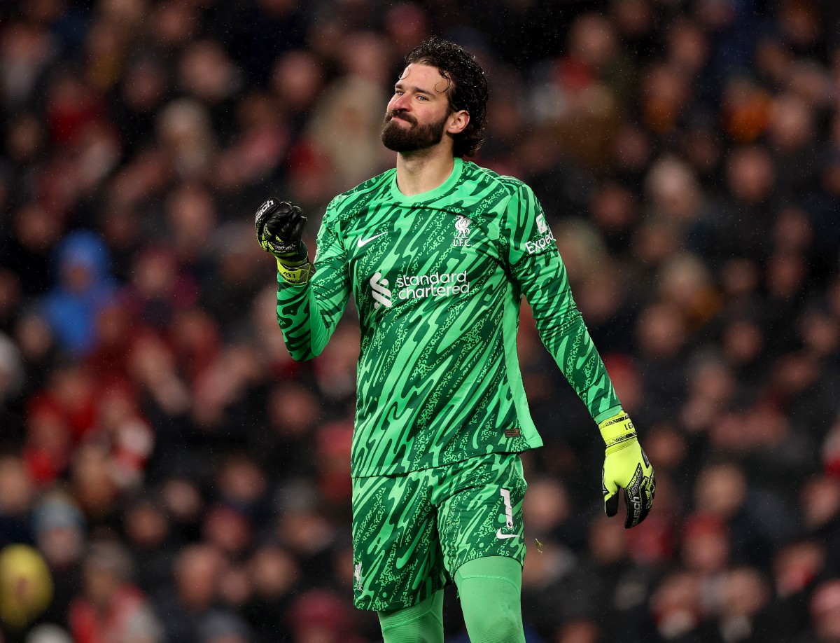 Alisson Becker of Liverpool in action against Newcastle