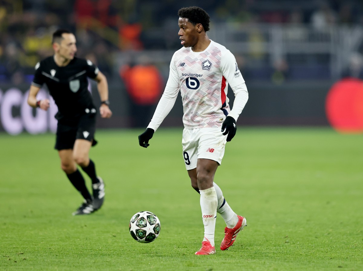 Jonathan David in action for Lille against Borussia Dortmund