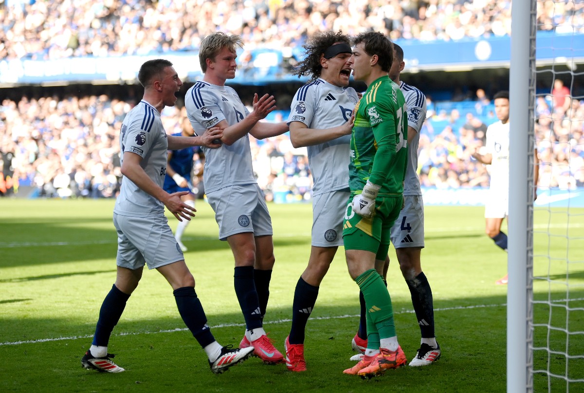 Leicester City players celebrate against Chelsea