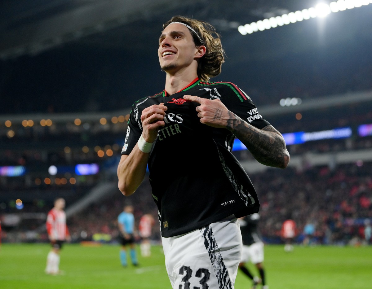 Riccardo Calafiori celebrates scoring for Arsenal against PSV