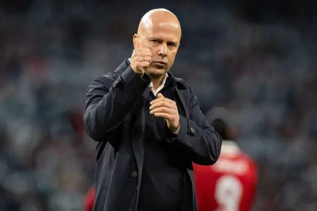 Arne Slot claps, applauds the Liverpool fans after the final whistle