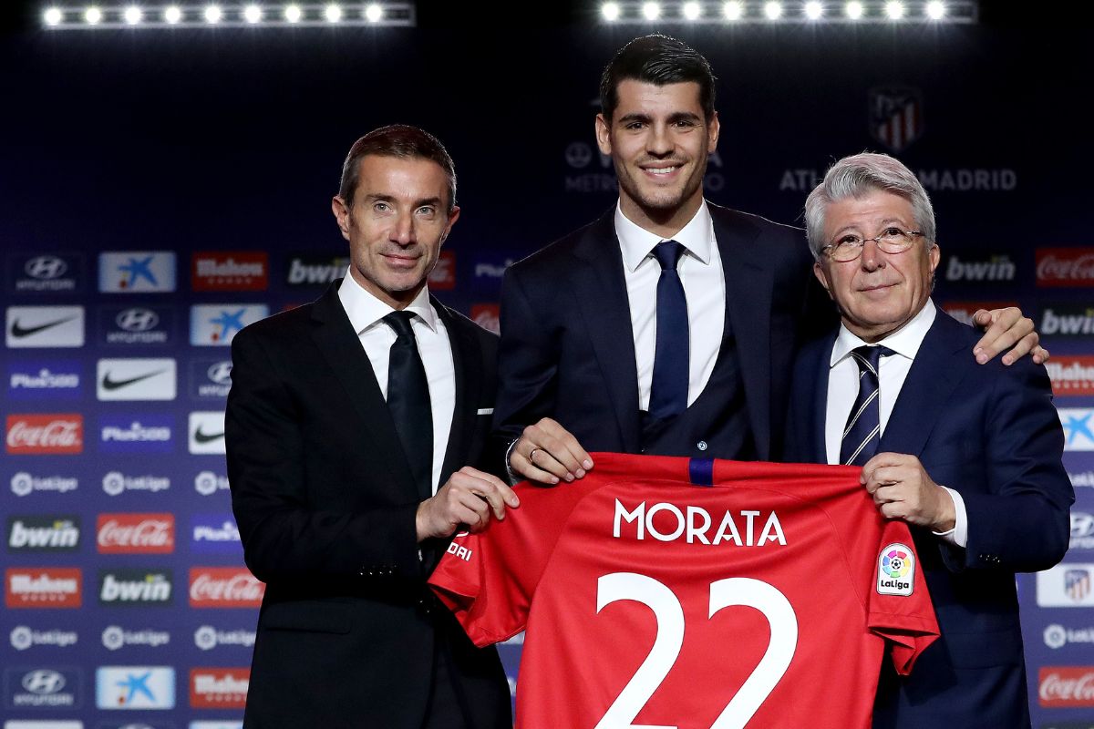 Andrea Berta (left) along with Alvaro Morata