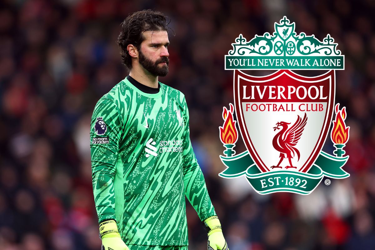 Alisson Becker looks on - with the Liverpool badge attached