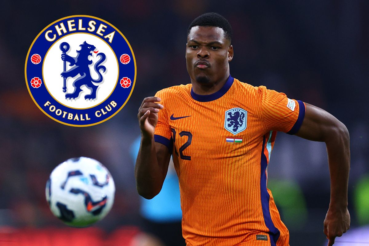 Denzel Dumfries of the Netherlands in action and pursuing a ball, with the Chelsea badge attached