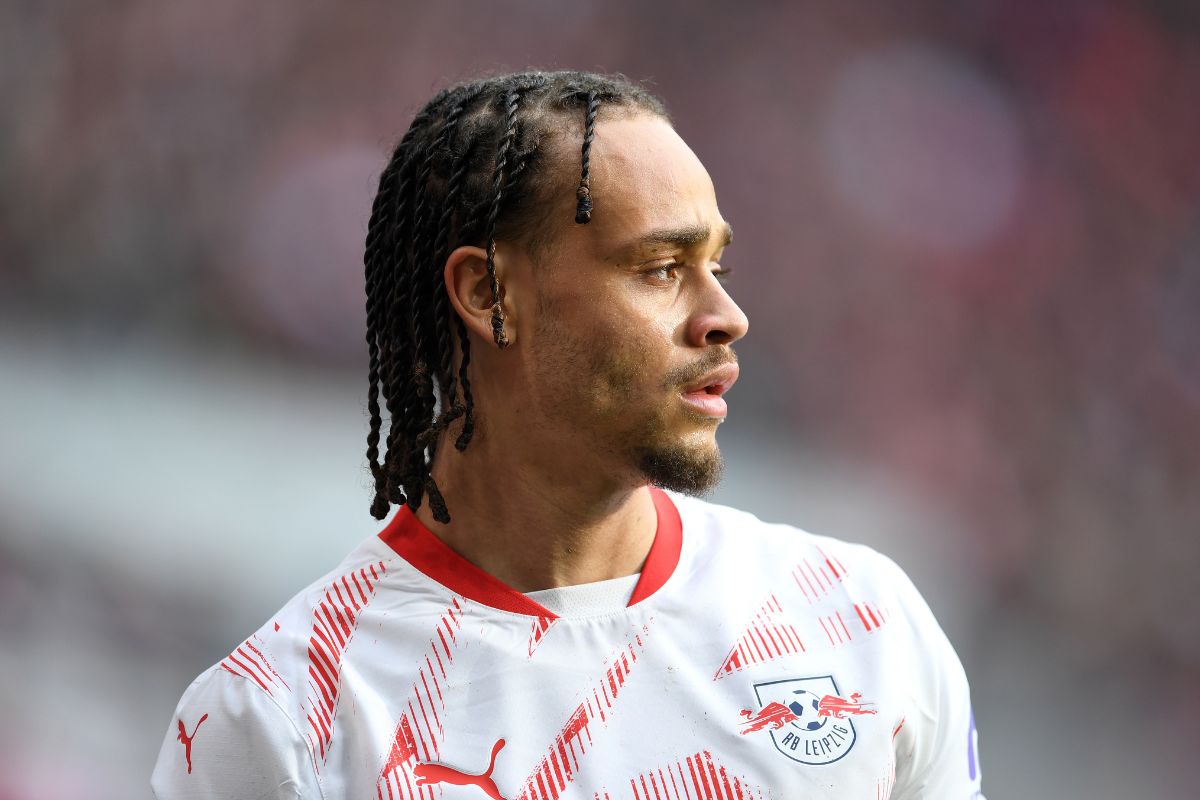 Xavi Simons looks on while in a RB Leipzig kit